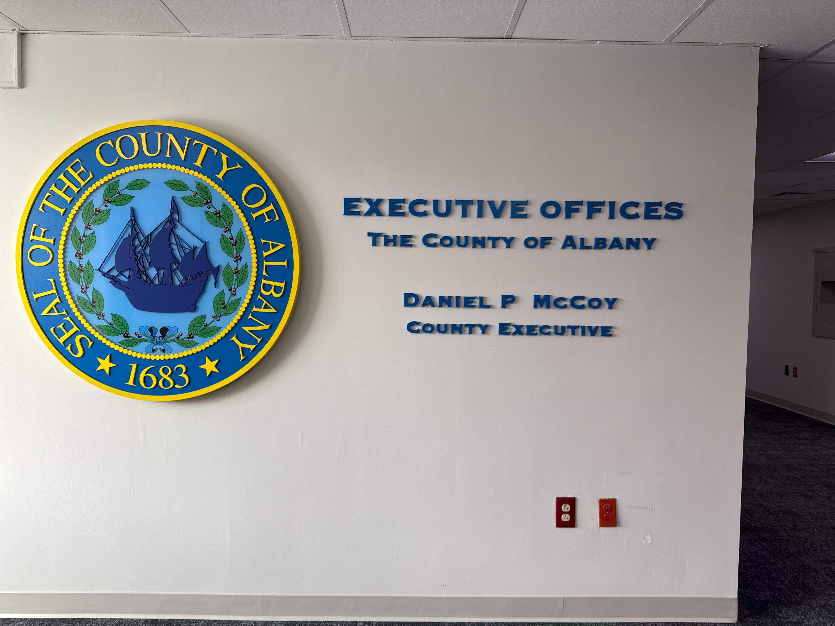 Albany County Executive Offices Dimensional Seal & Lettering Installation by FASTSIGNS of Saratoga Springs 