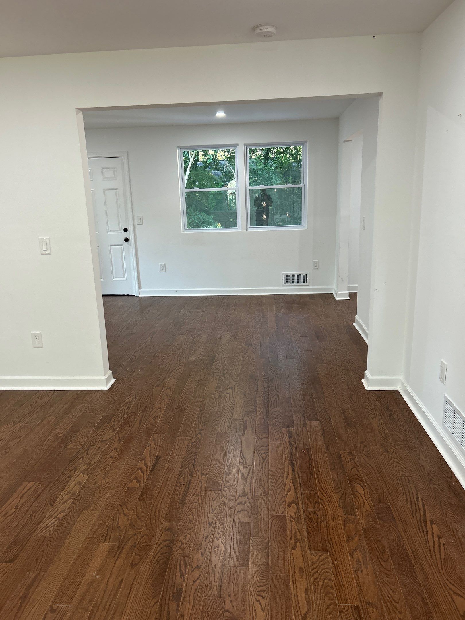 Replaced LVP with timeless solid oak by Footprints Floors of East Atlanta