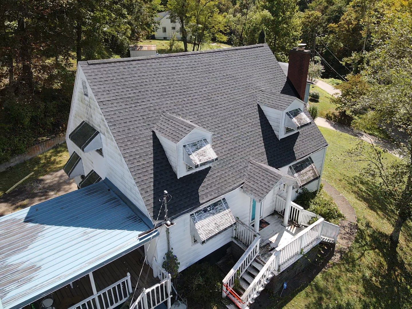 Residential Roofing Installation using GAF Timberline HDZ Charcoal by Rainstoppers Roofing