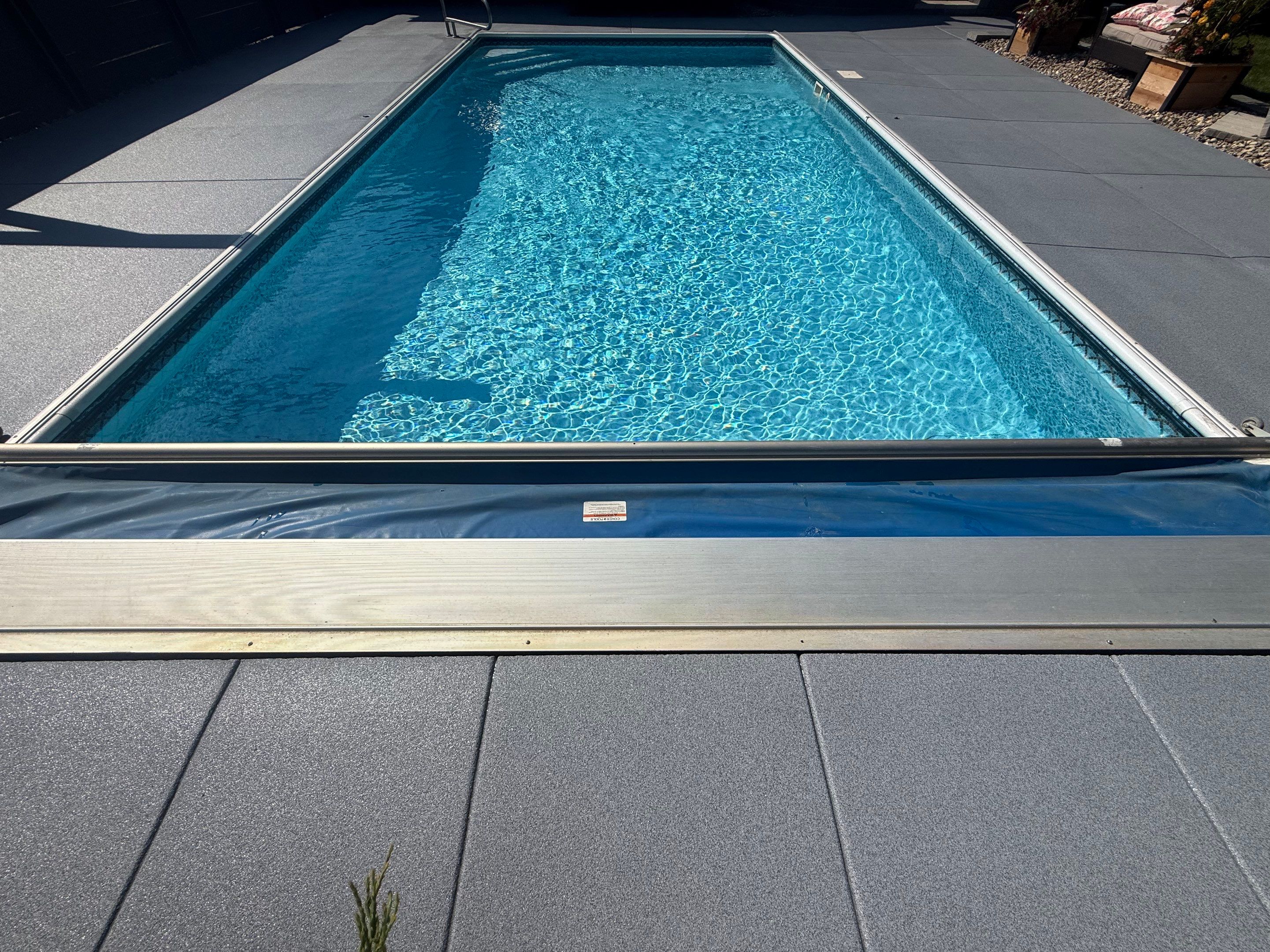 Garage Floor and Textured Pool Deck Coating in Sioux Falls by Select Painting, Coatings & Garage Cabinets