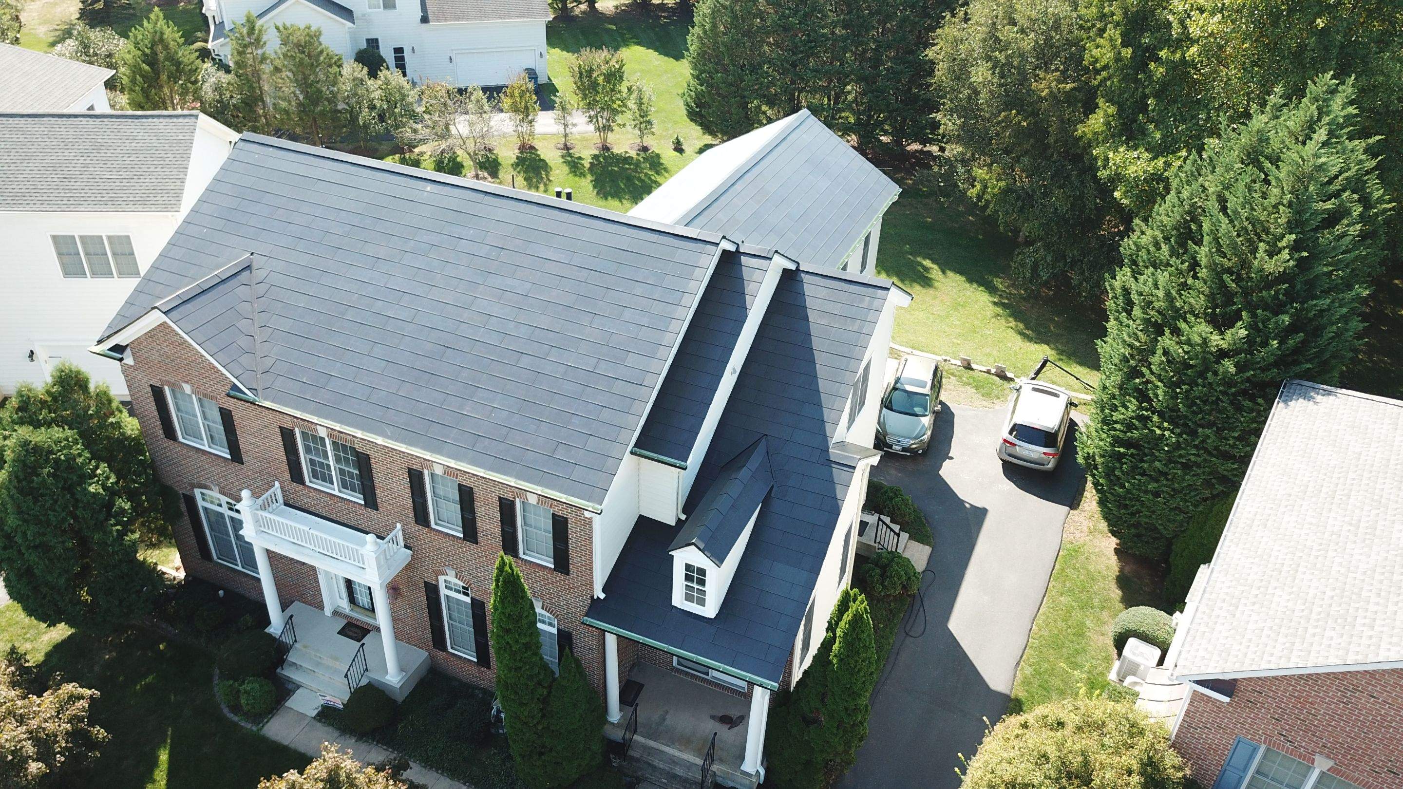 Tesla Solar Roof Replacement using Tesla Solar Roof V3 tiles by American Home Contractors