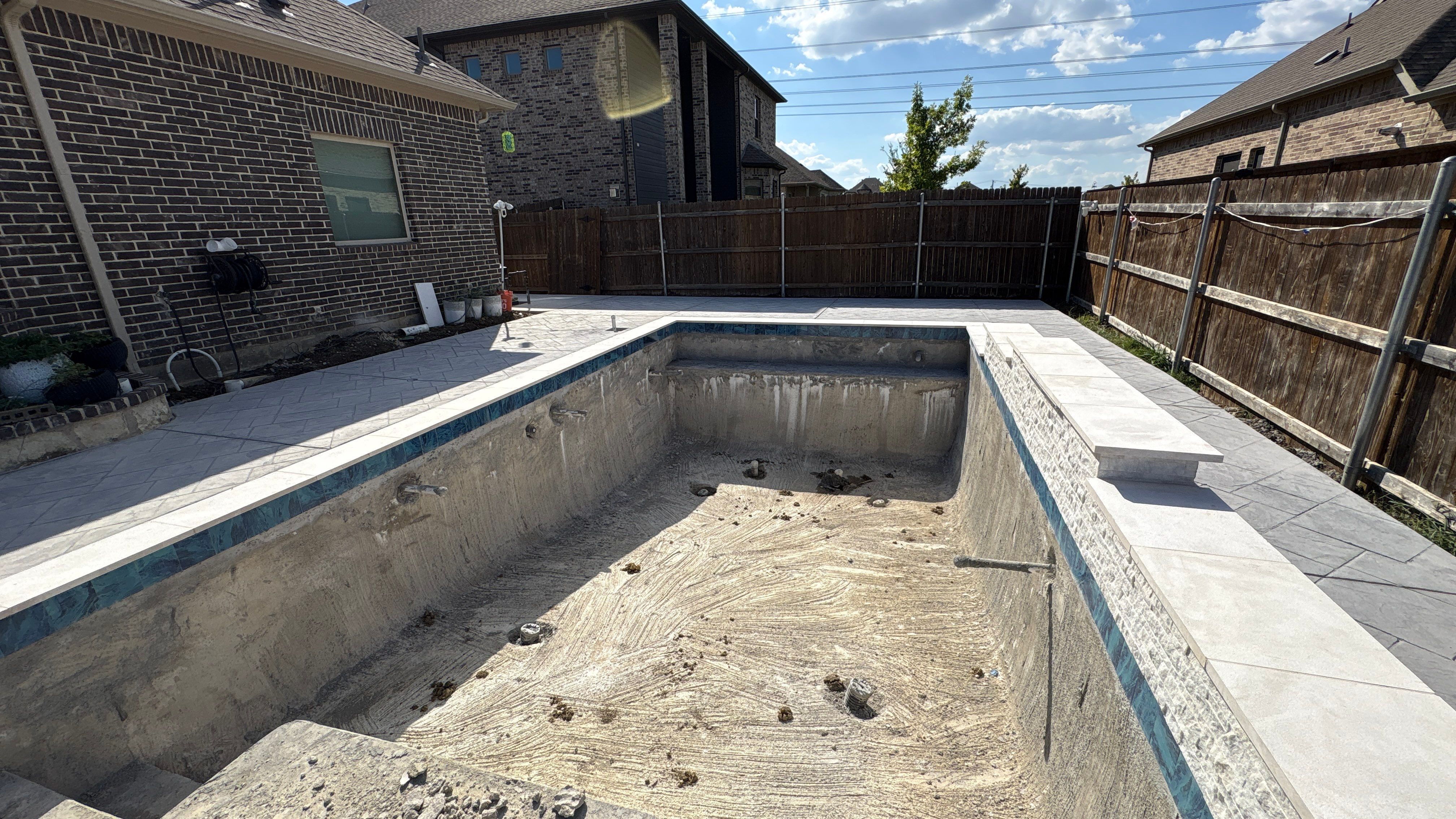 Geometric Pool with Tanning Ledge by Pinnacle Pools and Spas - DFW