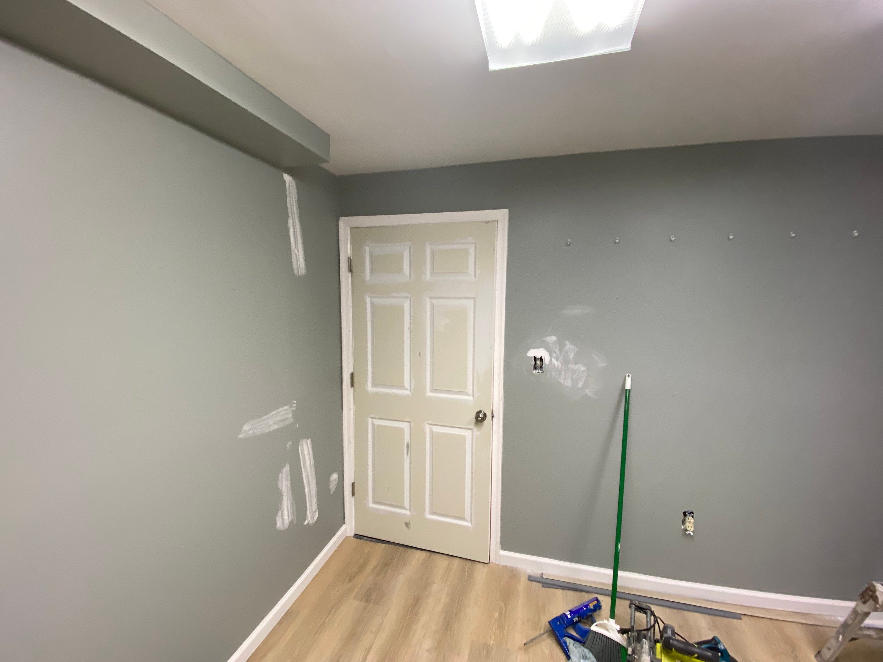 Laundry Room Redmodel using Lifeproof Luxury Vinyl Plank Flooring by The Smet Companies, LLC