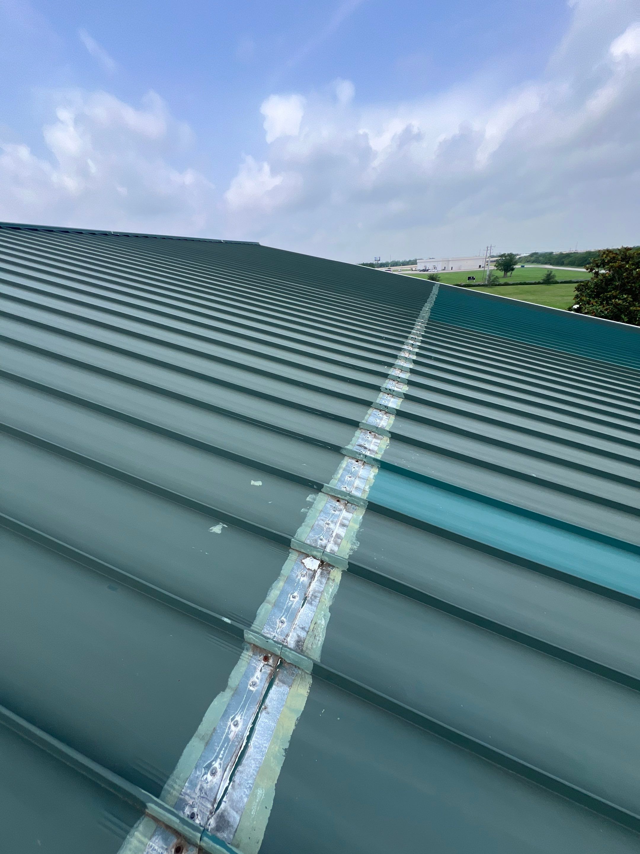 Hail Damage using Metal by Roof Repair Company