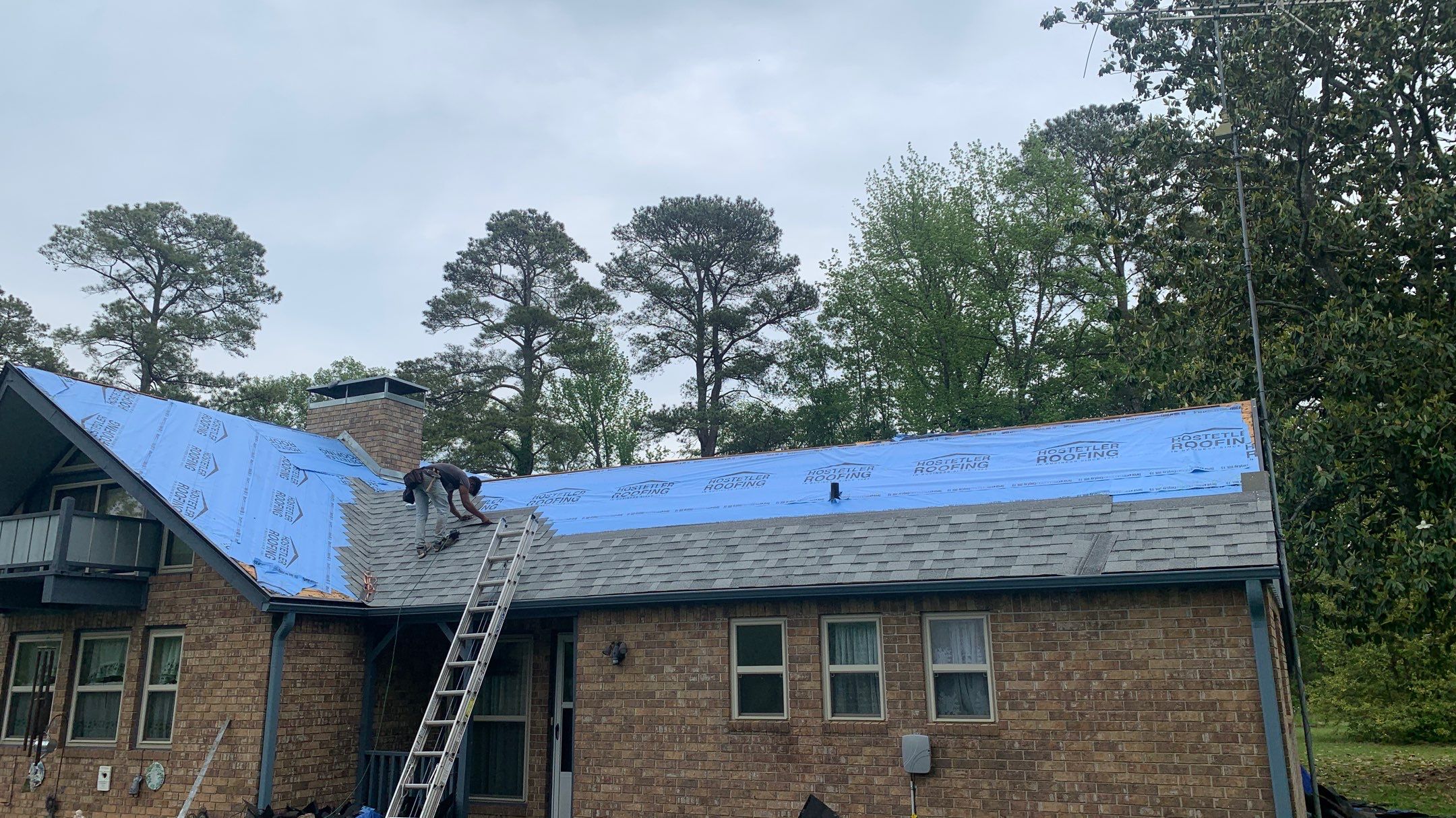 Residential Roofing Installation using 50 mil PVC by Hostetler Roofing