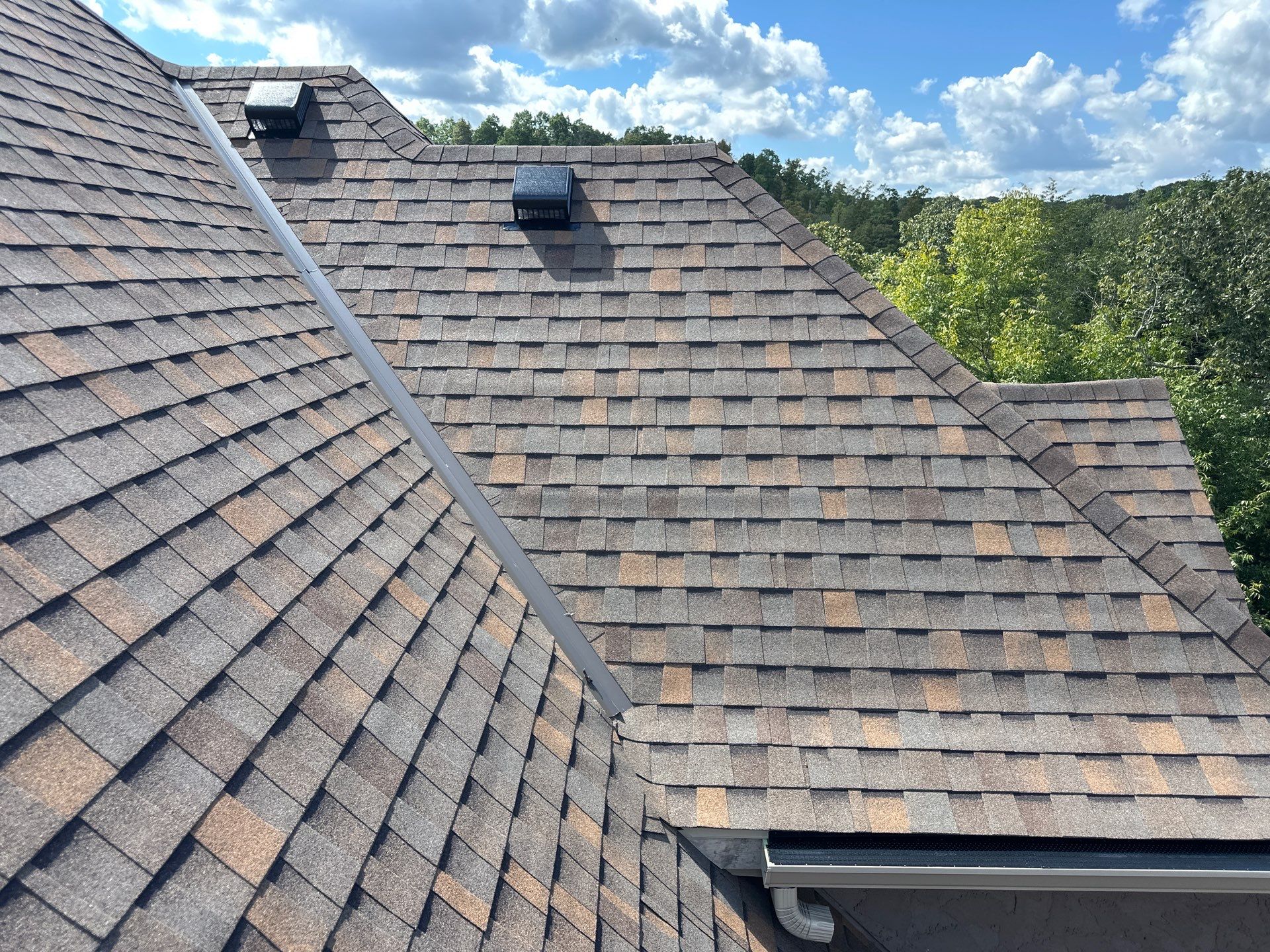 Residential Roofing + Gutters & Downspouts & Gutter Guards Install  by Titan Commercial & Residential Roofing 