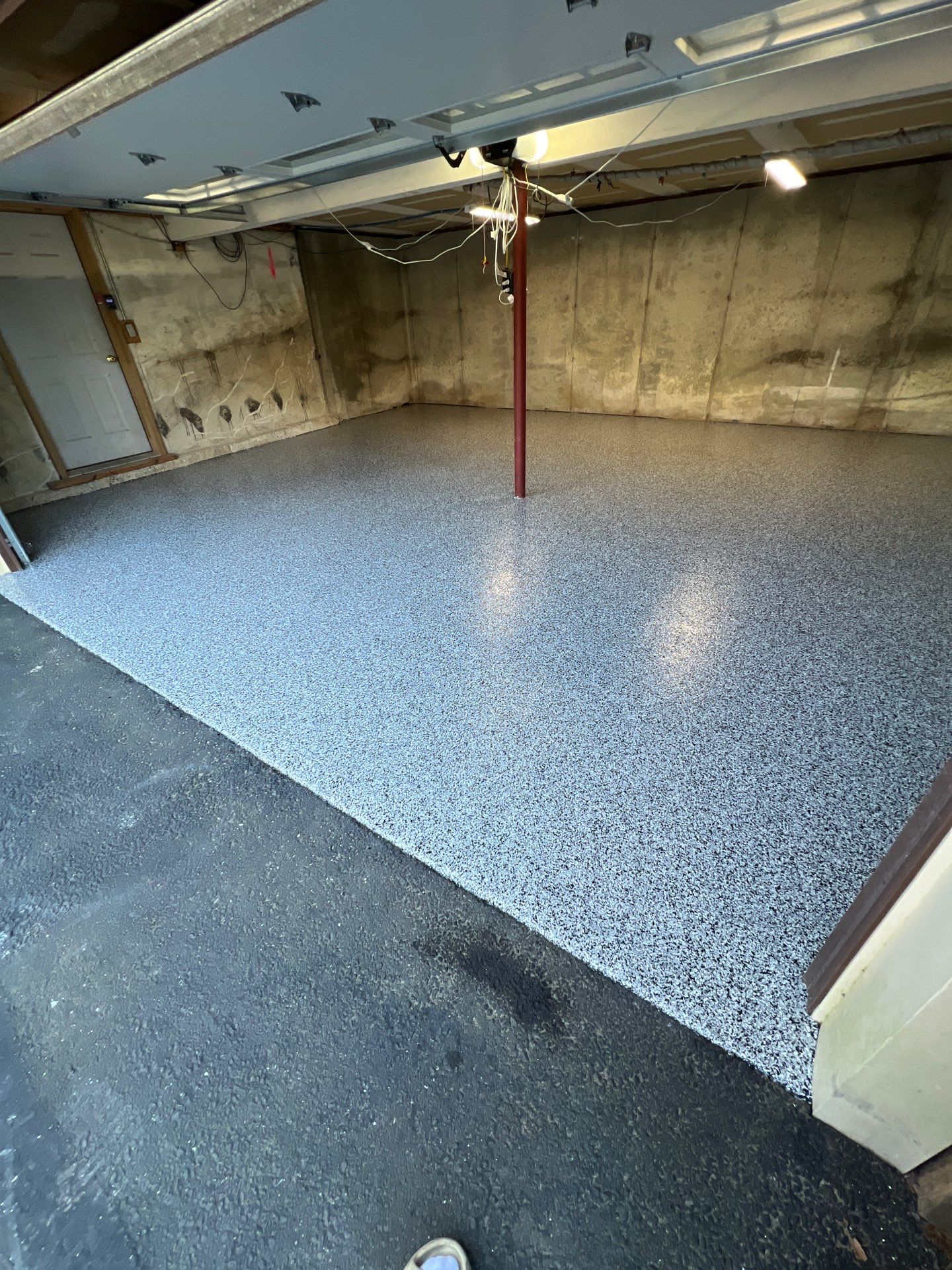 Garage in Londonderry, NH 03053 by Symphony Concrete Coatings