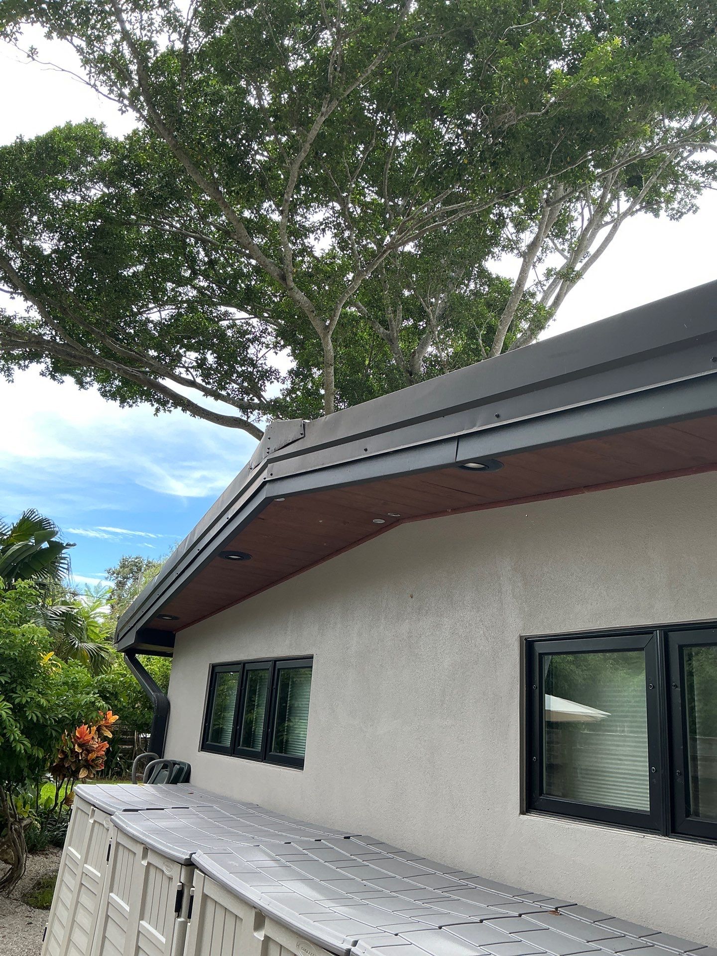 Black Seamless Gutters in Sarasota FL by Gutter Professors