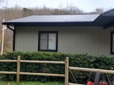 Metal Roof and Vinyl Siding, Soffit, Gutters using LifeTite Premium metal roofing 