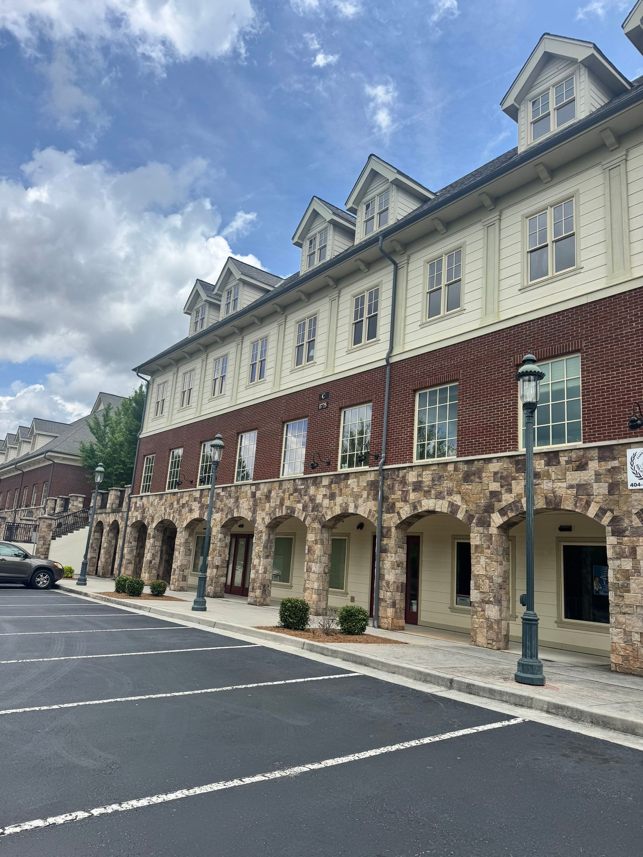 Commercial Exterior & Stairwell Painting – Corner Market by PGP Surface Solutions, LLC