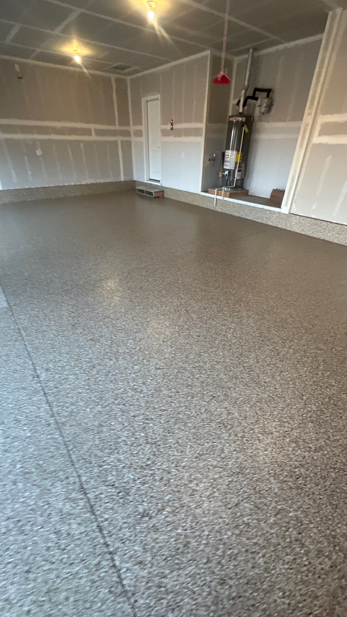 Garage Transformation using Sandstone by Croc Coatings, LLC