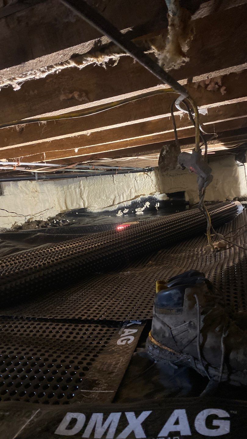 Crawl space encapsulation and Waterproofing using GrateDrain Waterproofing System by Toledo Basement Repair 