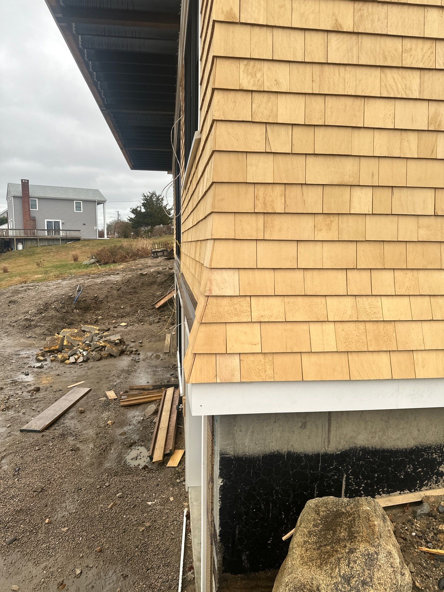 Great Island - Red Cedar Roofing, Yellow Cedar Siding, Standing Seam Copper, & Copper Gutters  by Rinaldi Brothers
