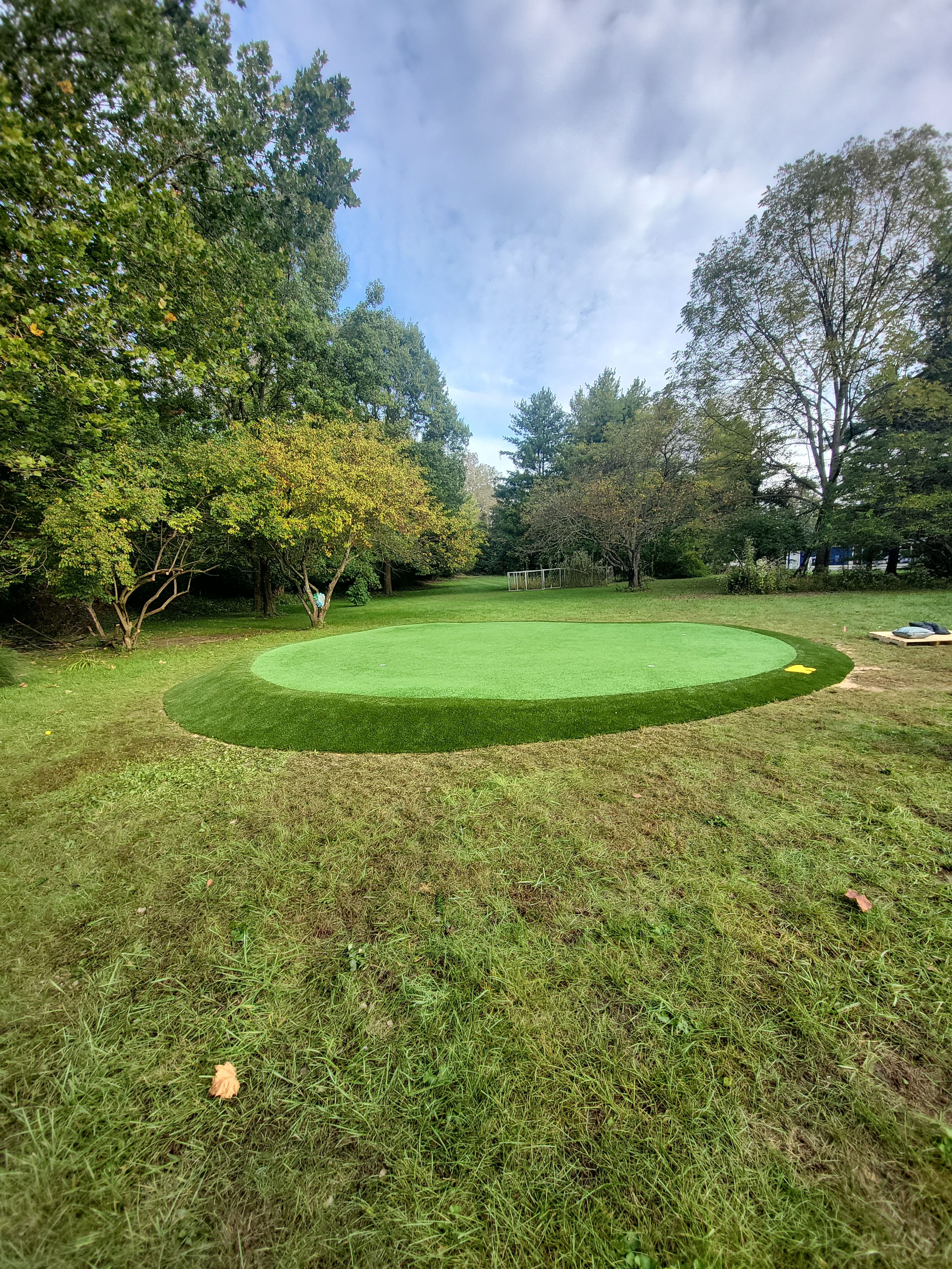 Custom Synthetic Putting Green Installation for Aspiring Collegiate Golfer in Worthington, Ohio by Southwest Greens Midwest
