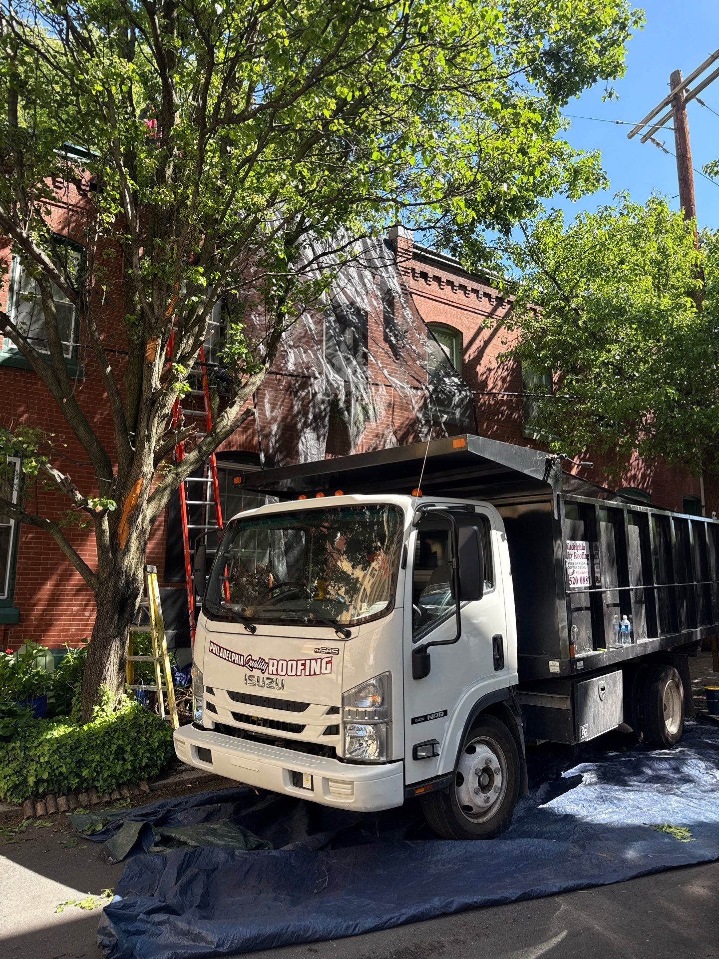 Roof Replacement and Custom Trex Roof Top Deck Project in Philadelphia, Pennsylvania by Philadelphia Quality Roofing