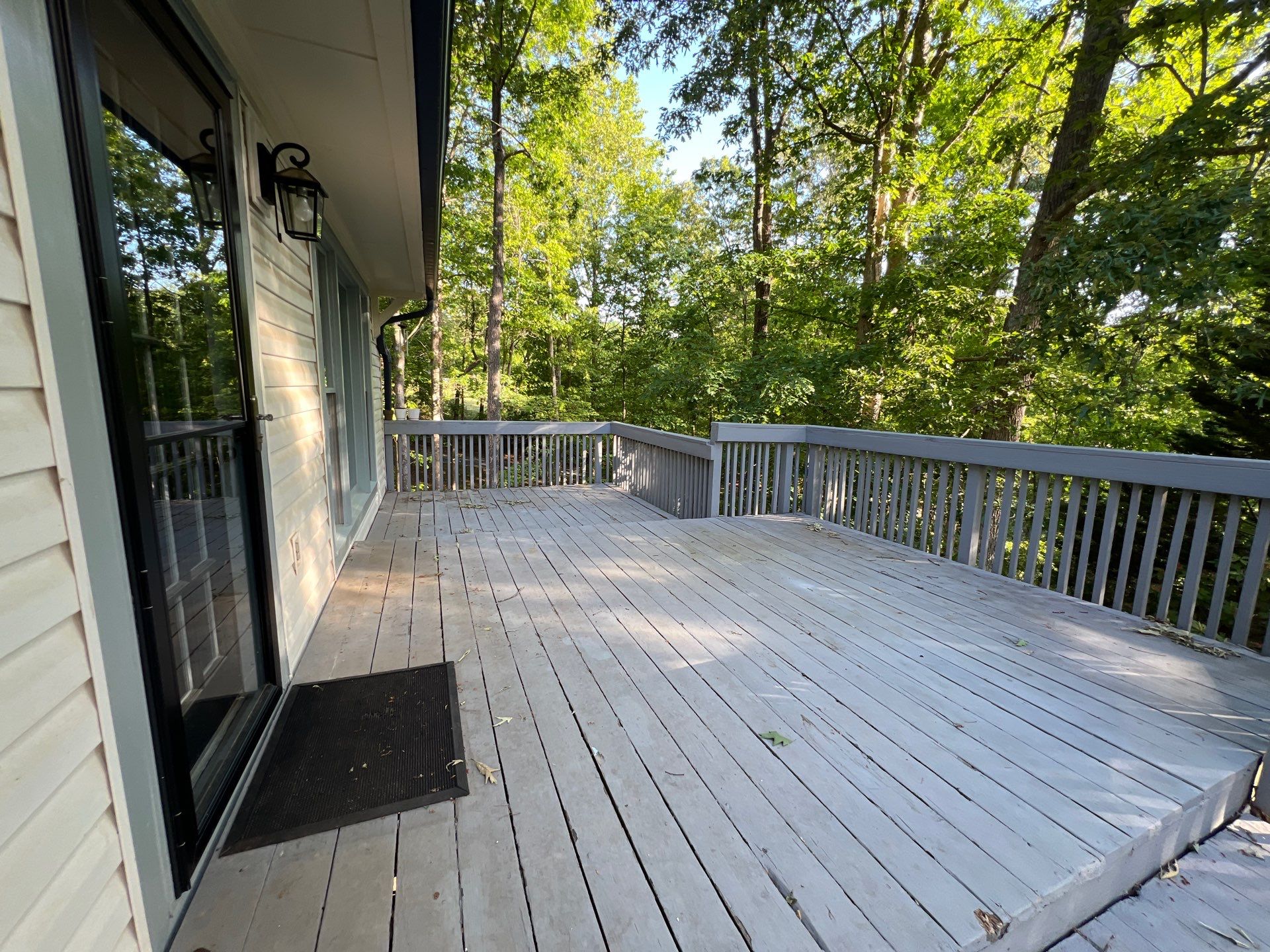 Pressure-Treated Wood Deck Resurfacing and Staircase Reconstruction in Canton by Swift Home Renovations