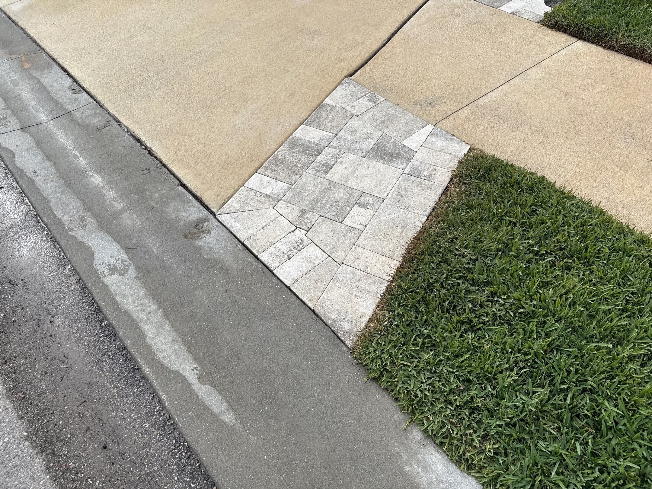 Rust Stain Removal from Concrete Driveway and Pavers in Park East at Azario | Lakewood Ranch, FL by Sunshine AquaWash