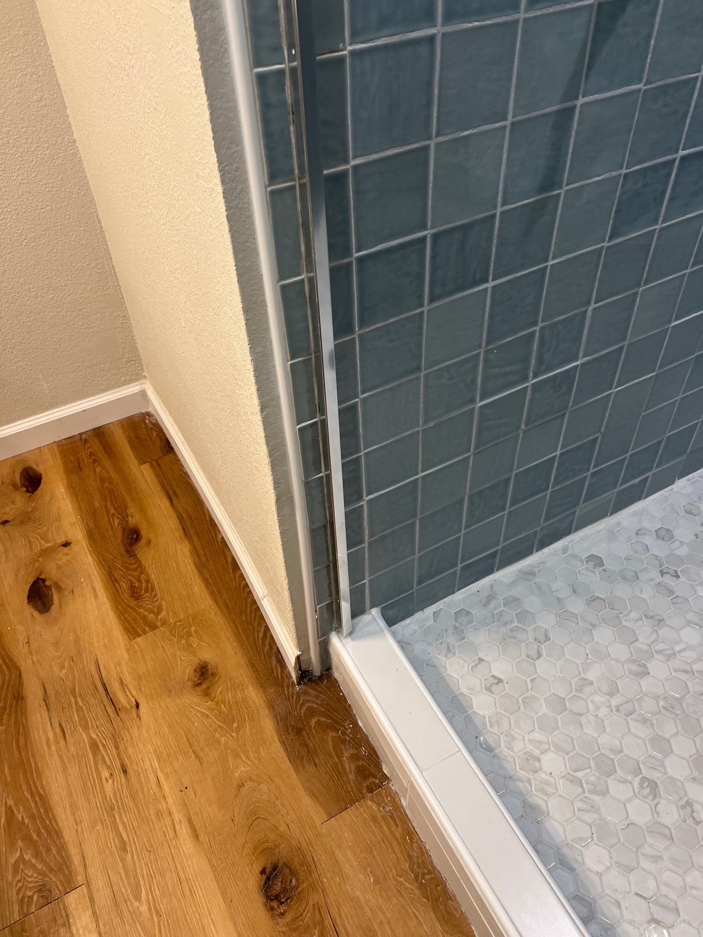 Remodeled and expanded Shower by TXN Remodeling n Construction