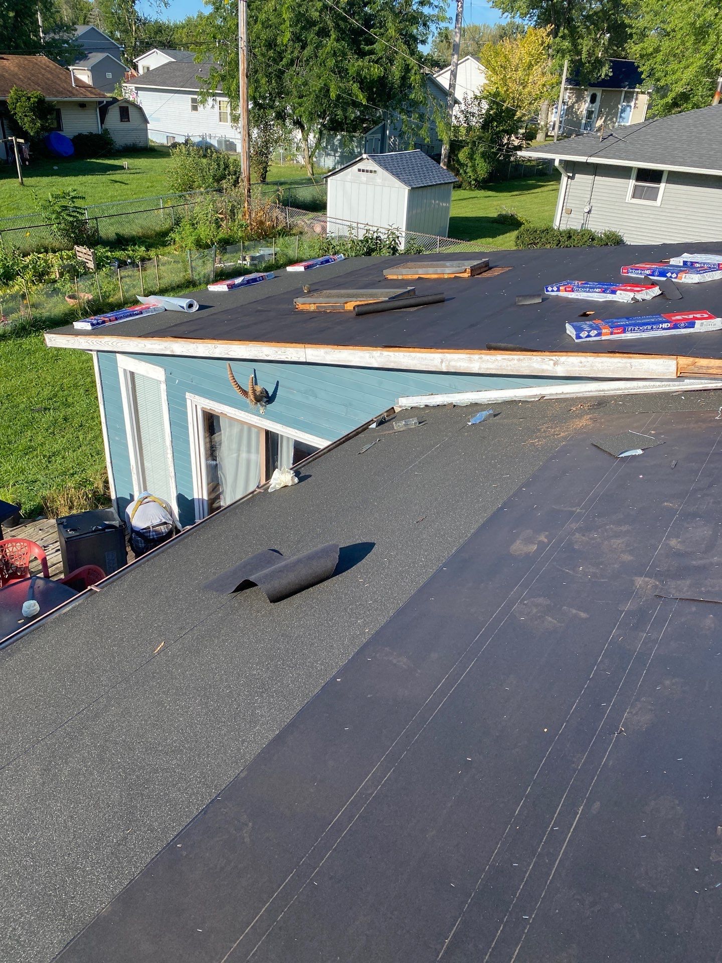 Asphalt Roof Replacement by Custom Installations