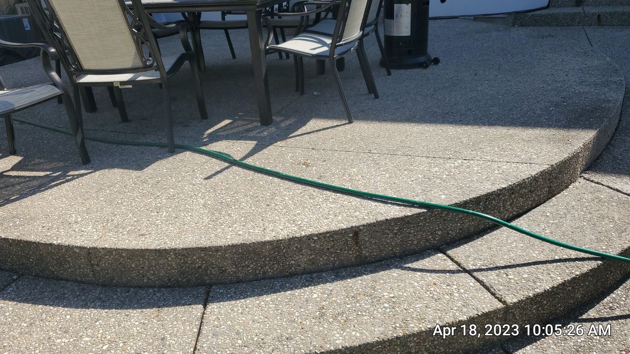 Aggregate concrete cleaning and sealing using Surebond SB-9000 by Northern Power Washing LLC.