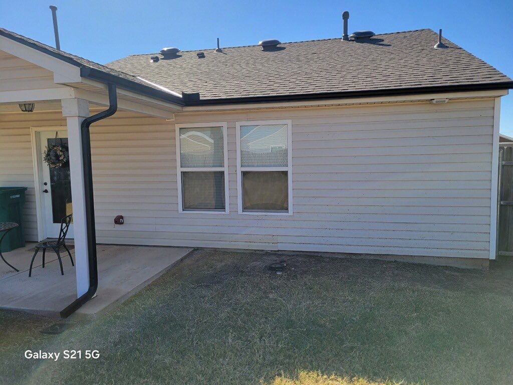 Roof Replacement and Gutter Installation in Edmond, OK by McCann's Roofing and Construction