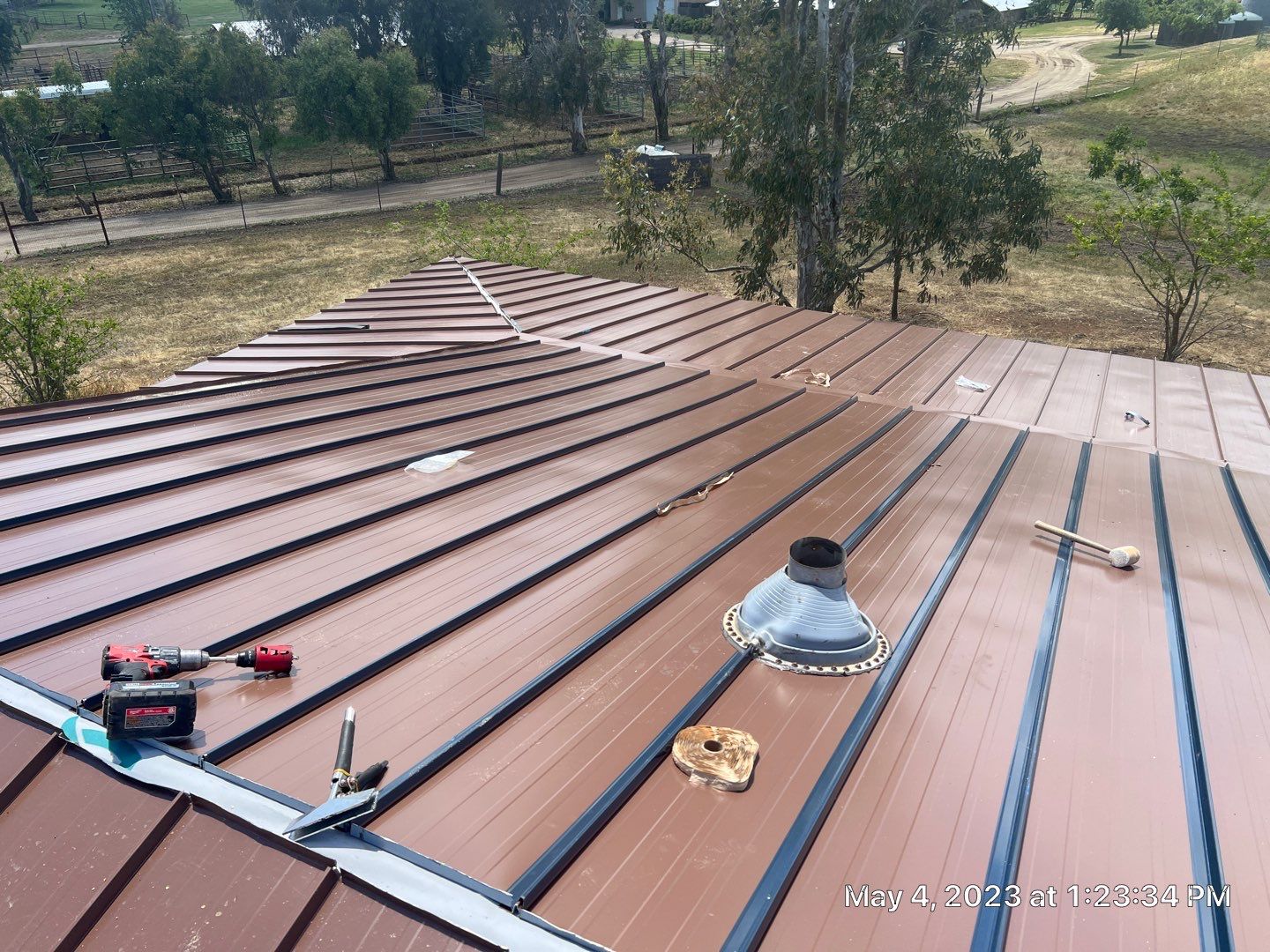 Metal roofing installation using Standing seam metal roofing system by Straight Edge Roofing Inc