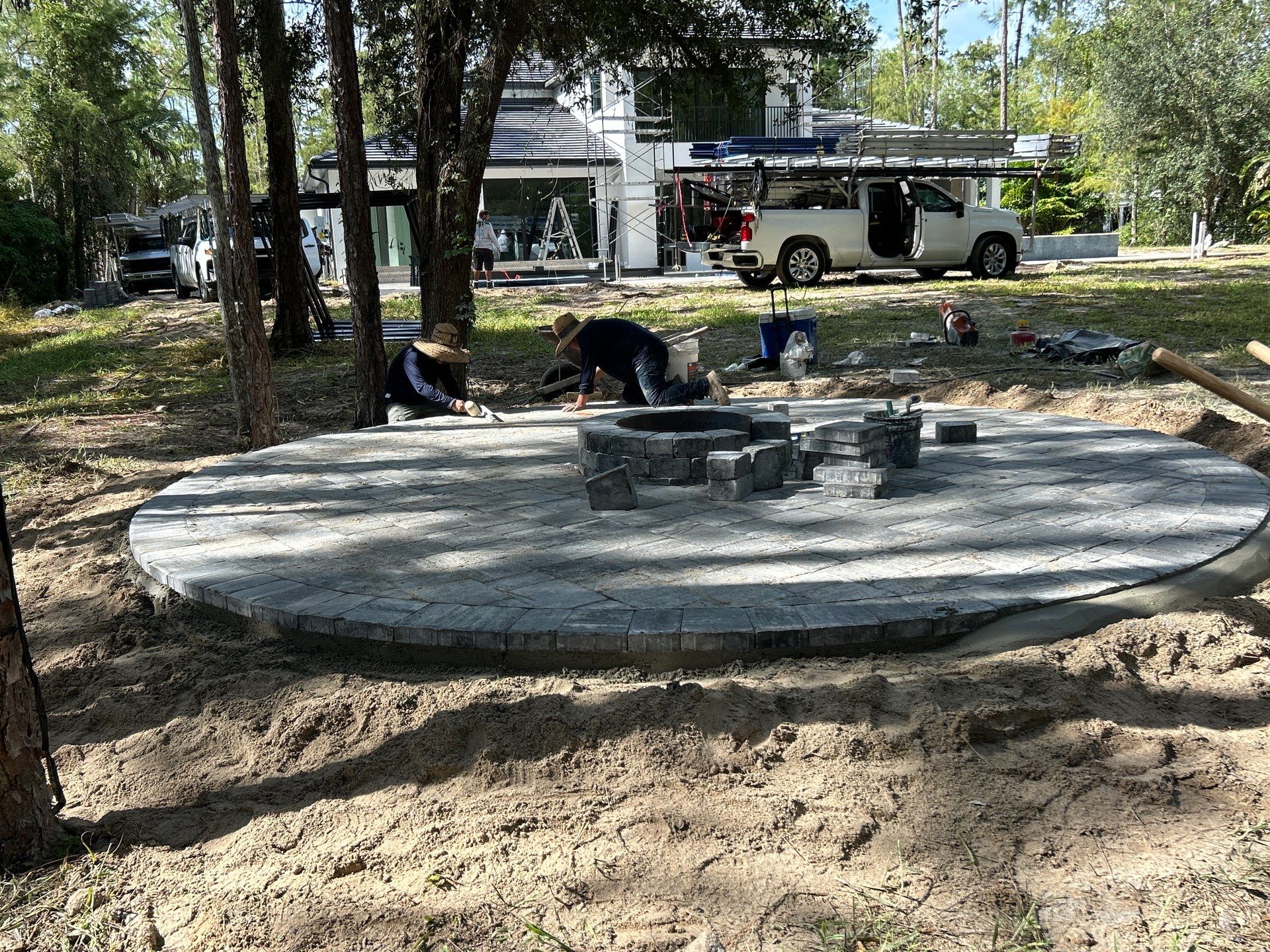 Fire pit and seating area/Oaks Blvd Naples by Old Town Pavers Llc