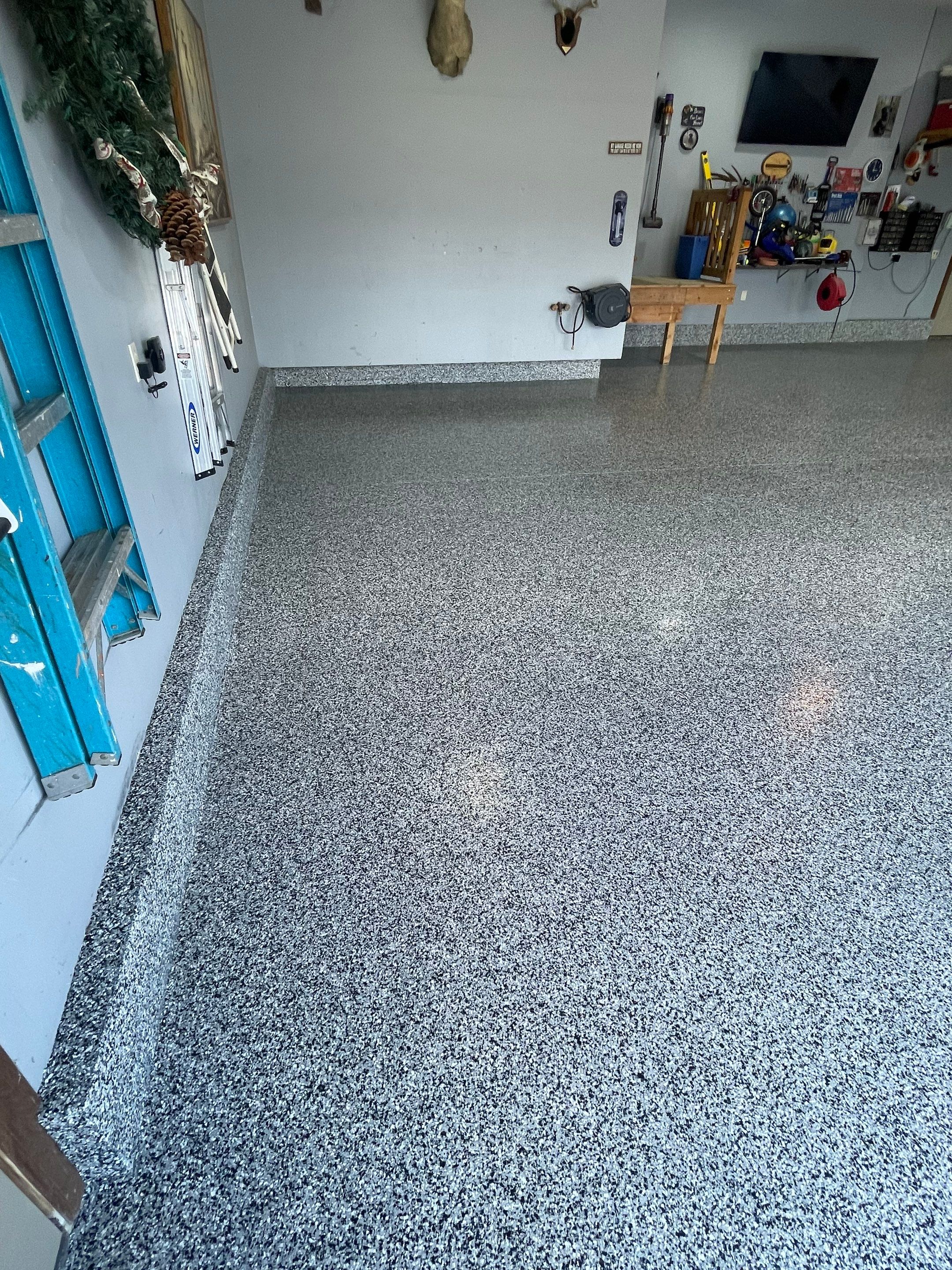 Residential Garage Floor Coating in Sioux Falls by Select Painting, Coatings & Garage Cabinets