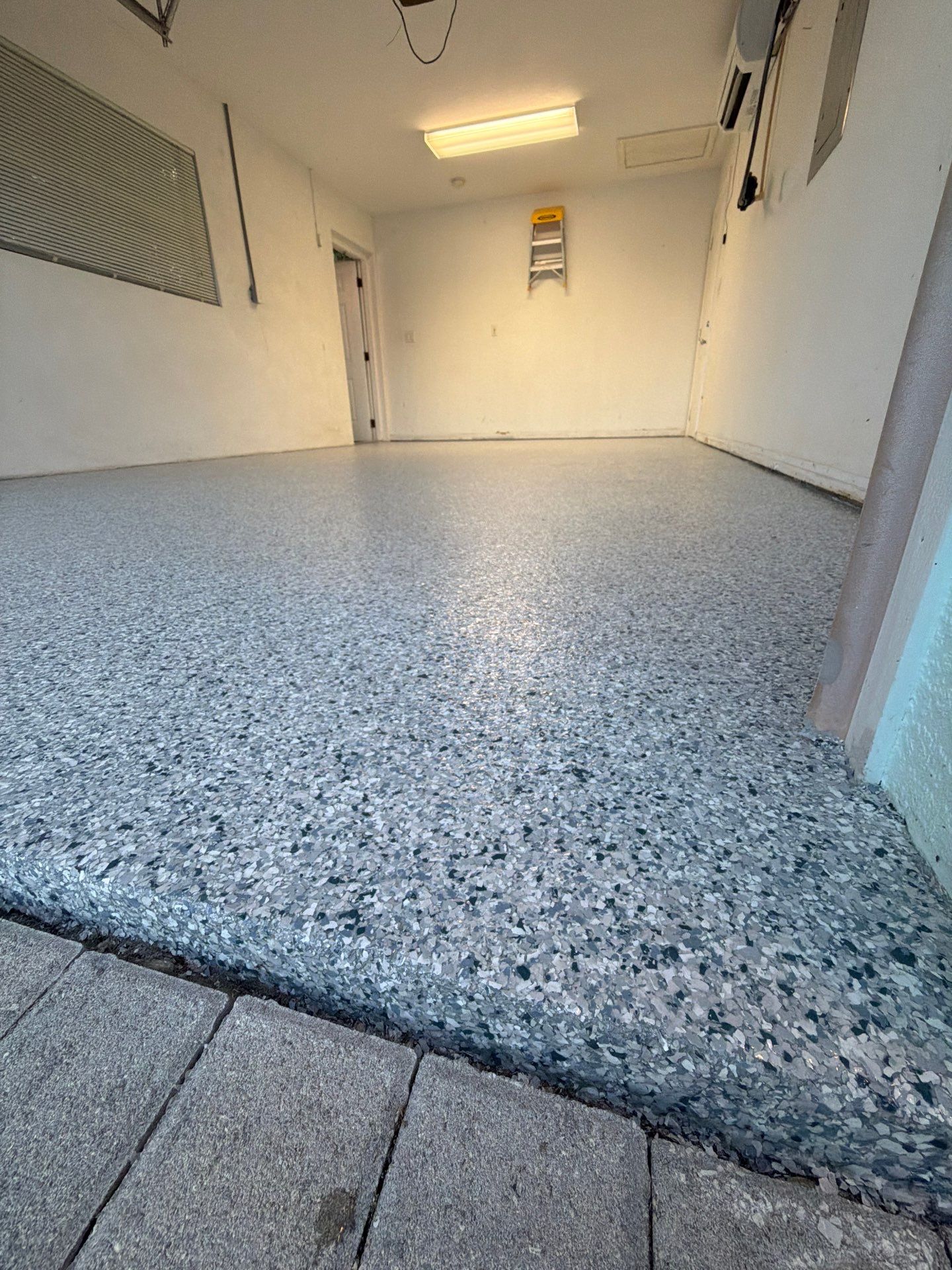 “Tidal Wave” Garage Floor in Key Colony Beach, FL by Tropical Epoxy Coatings & Creations LLC 