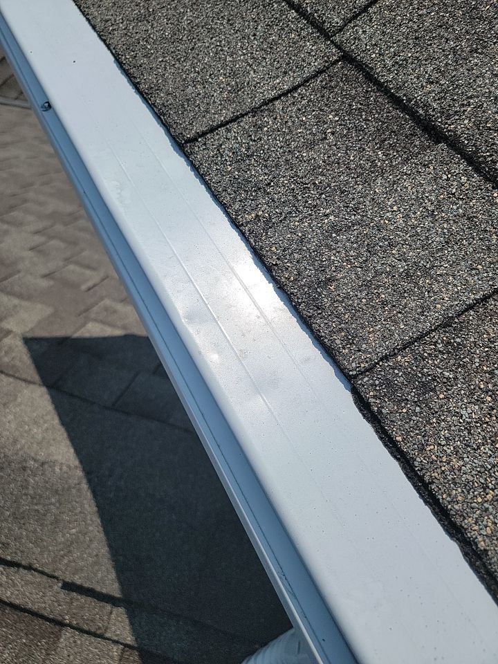 Residential Roofing Installation using Certainteed Landmark Moire Black by MODERN EXTERIOR SYSTEMS