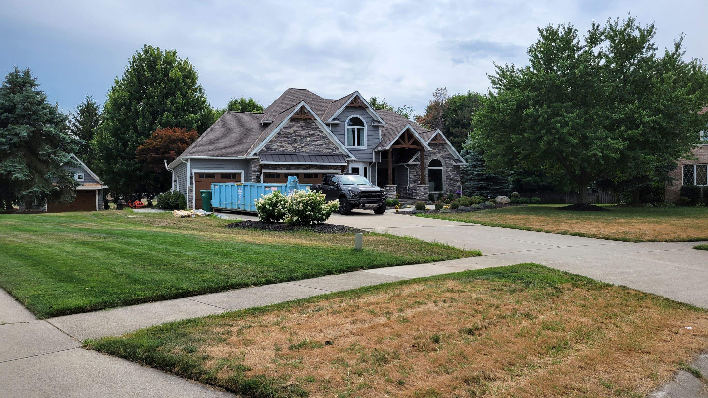 Garage Metal Roof using Standing Seam Metal by Absolute Roofing and Construction