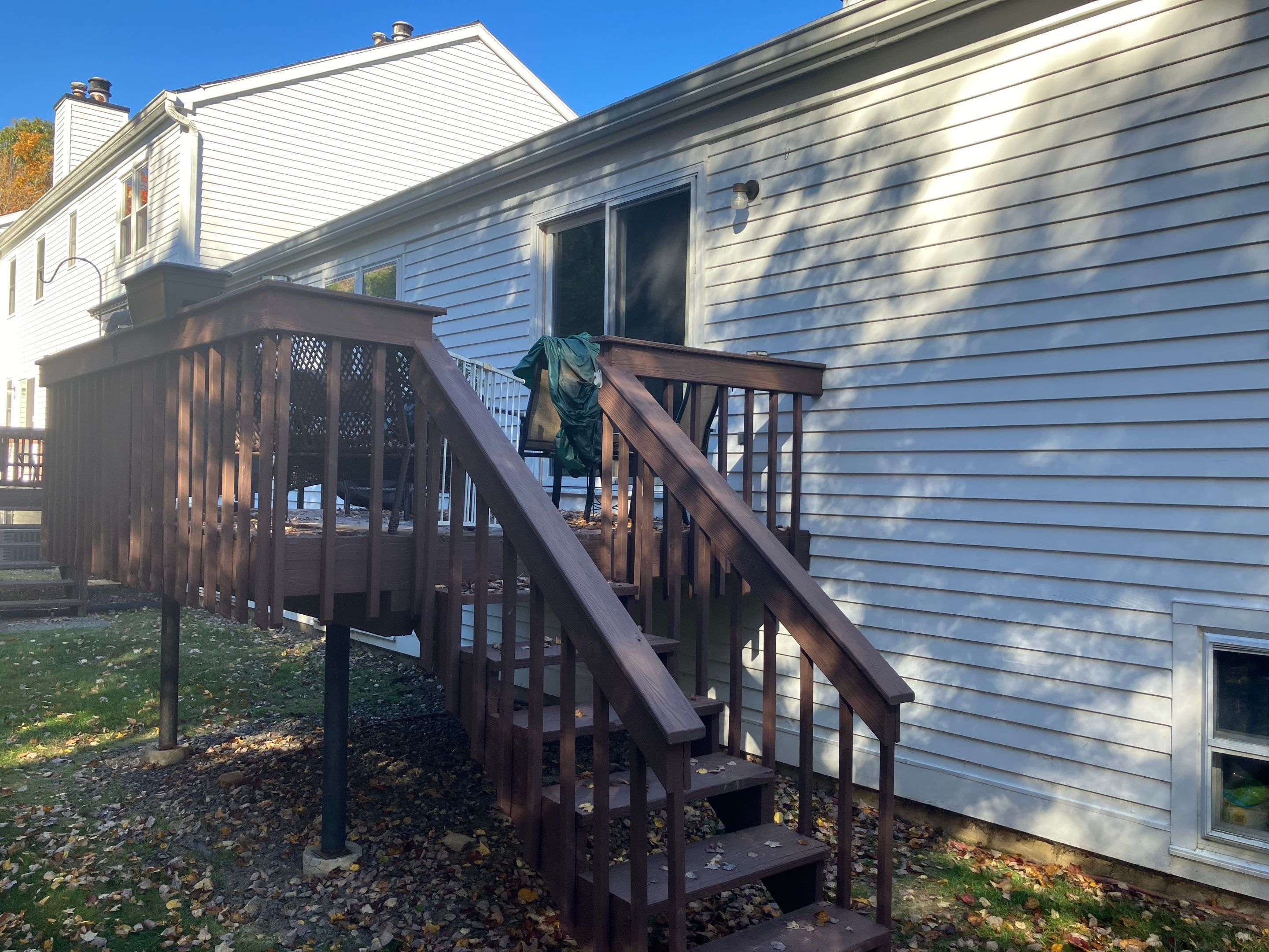 Retractable Awning Installation & Exterior Upgrade by DiGiorgi Roofing and Siding Inc