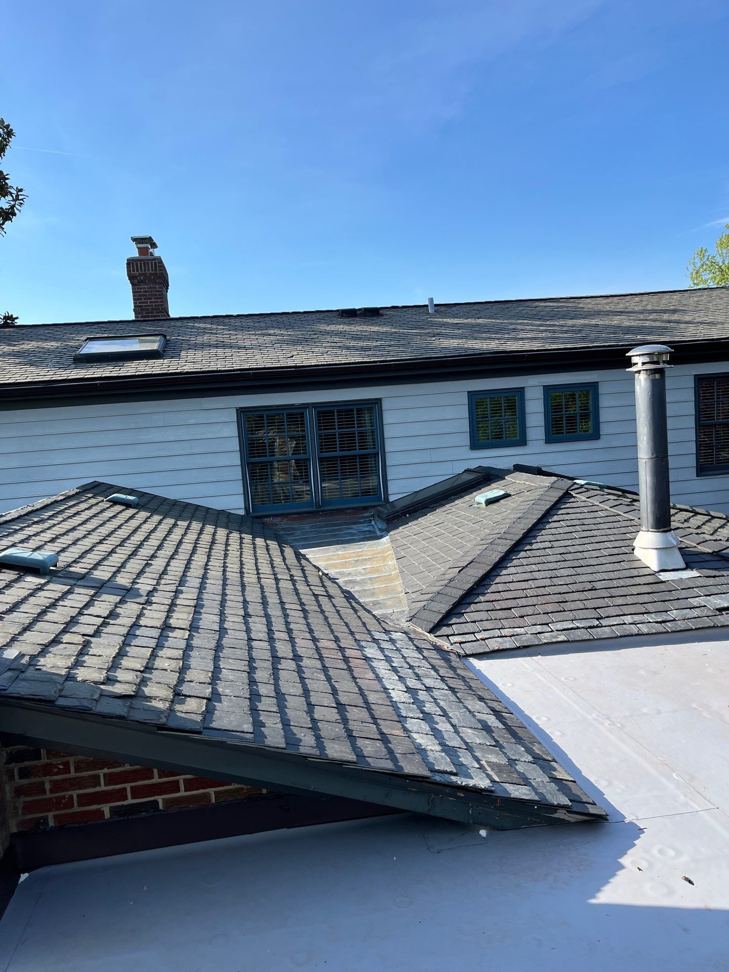 Arlington: Buckingham Slate and Carlisle Syntec TPO Roof by RM Banning, Inc.