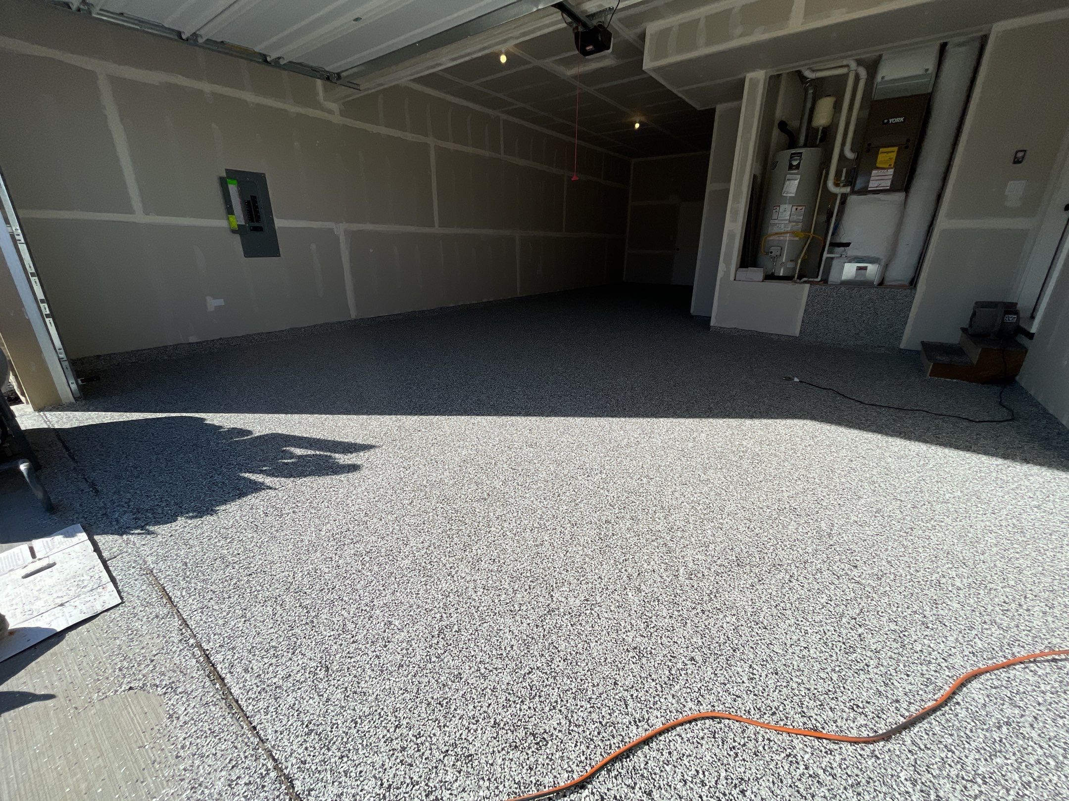 Garage Transformation using Domino by Croc Coatings, LLC