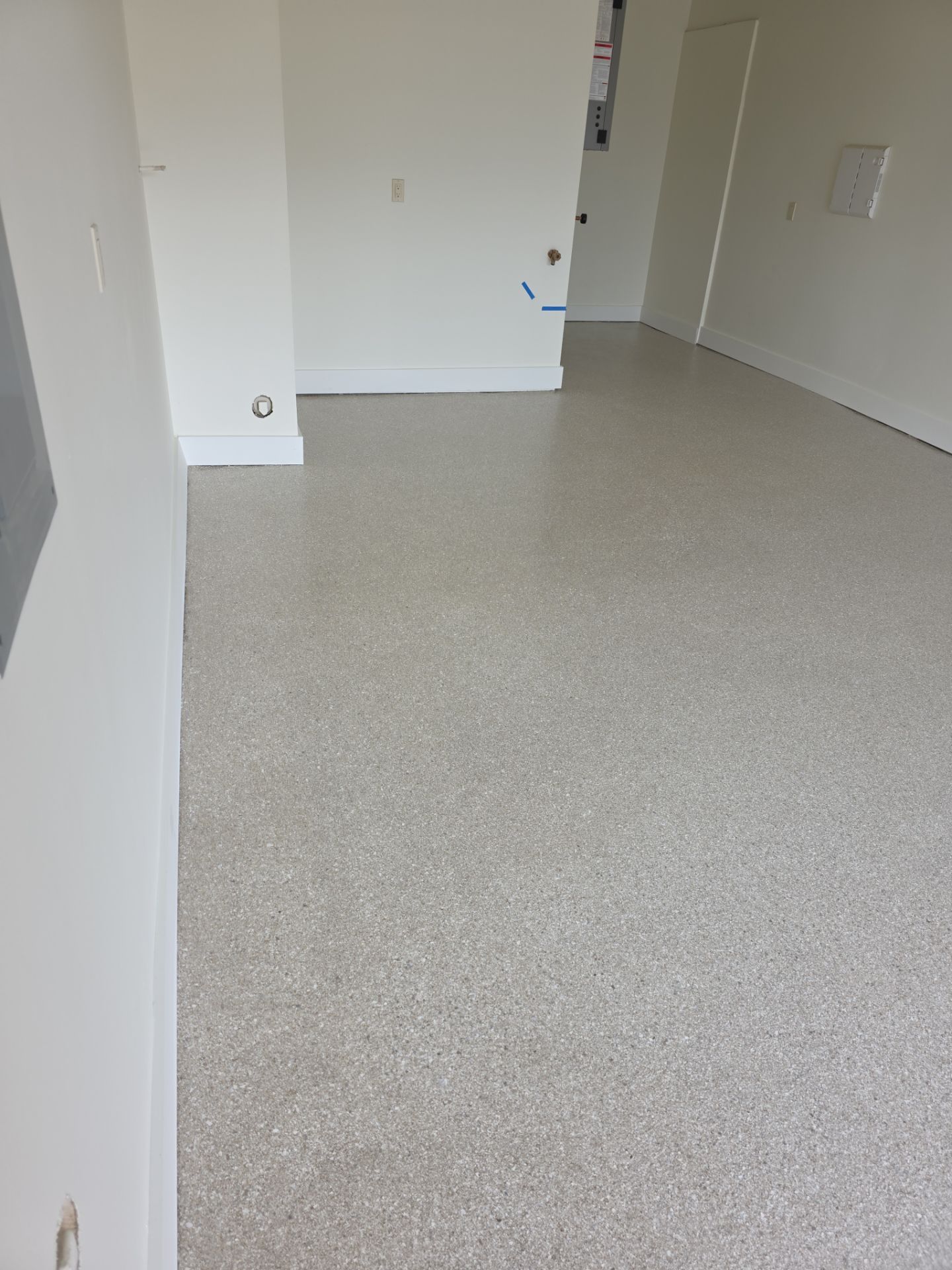 Garage Transformation using Sandstone by Croc Coatings, LLC