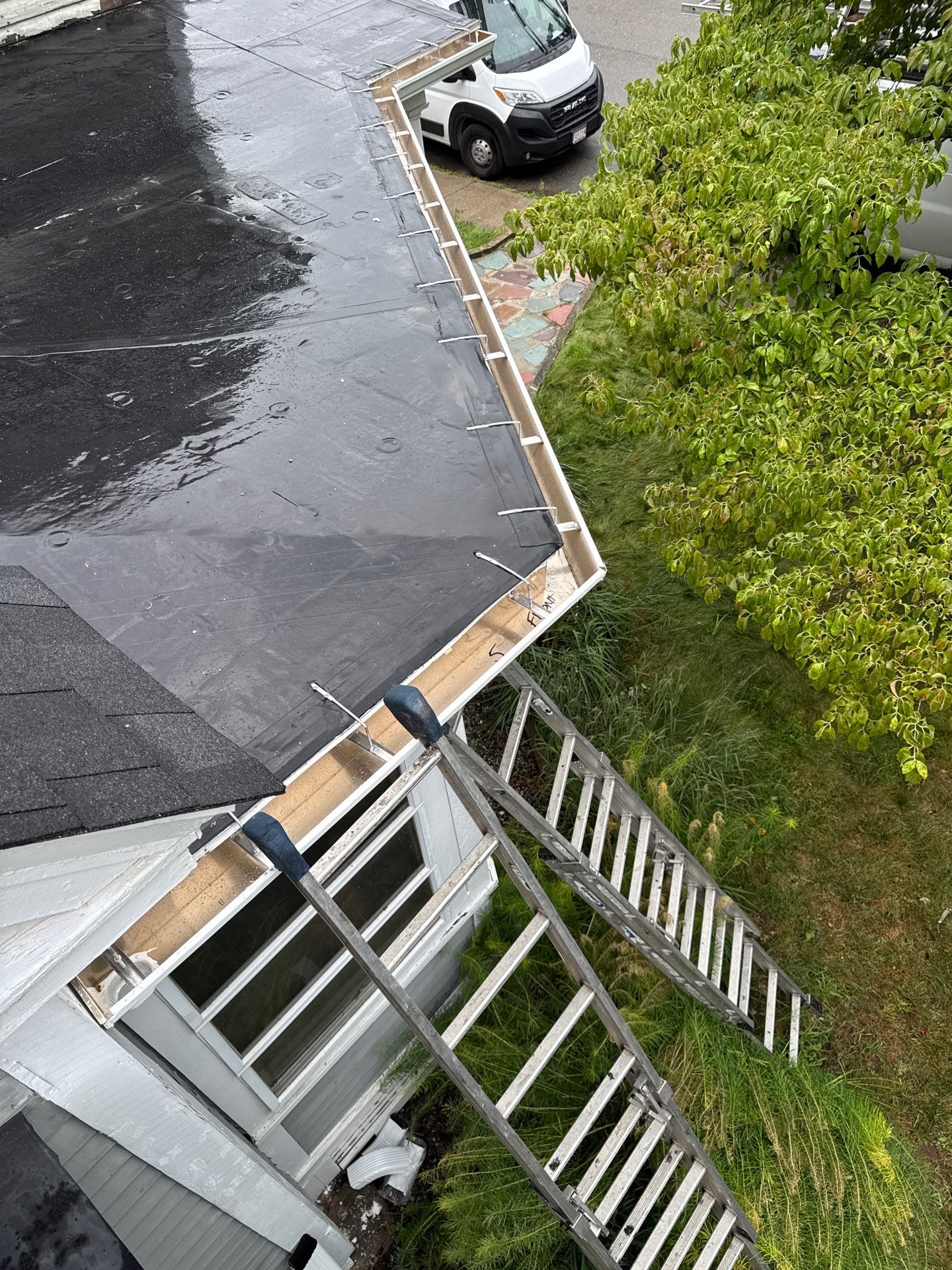 Full Roof Replacement + Custom Gutter Install | Onyx Black Finish by Mighty Dog Roofing of Greater Middlesex County