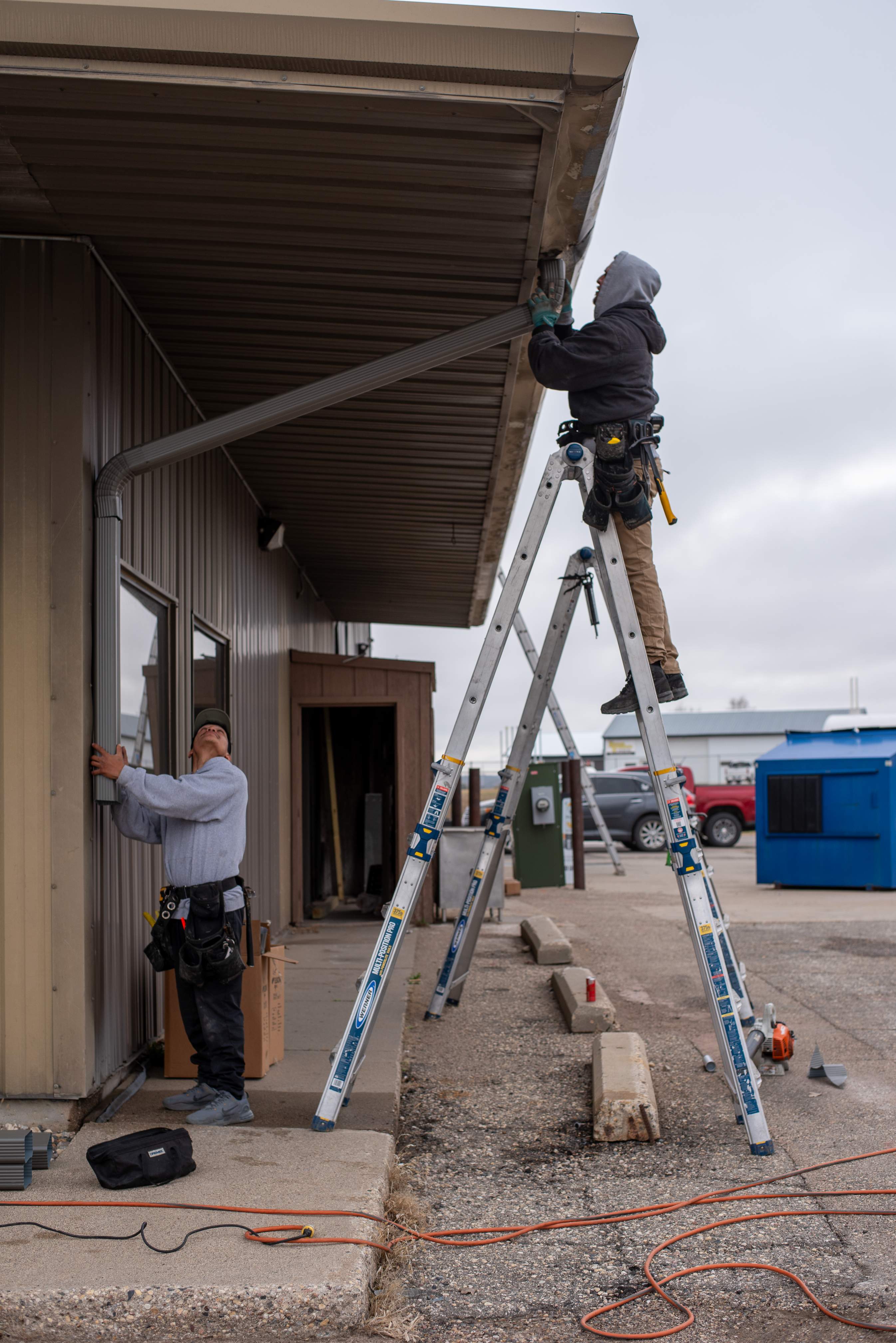 Commercial Gutter Repair in New London MN | Reseaming Gutters & New Downspouts by Next Level Seamless Gutters / Exteriors Inc.