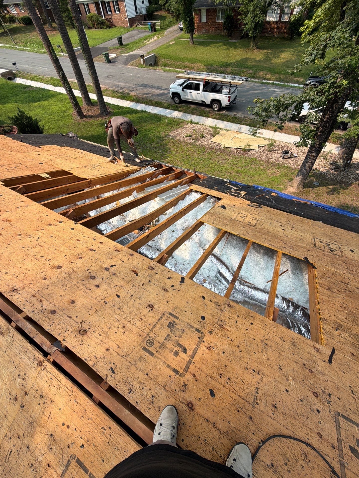Asphalt Shingle Roof Replacement and Gutter Installation in Richmond by Cade Construction