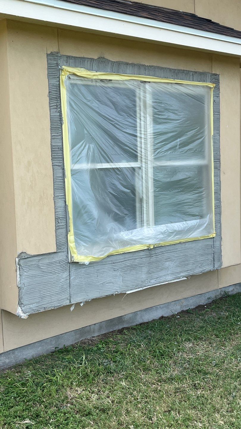 Installing Windows on a Submarine  by Bayfront Roofing and Construction
