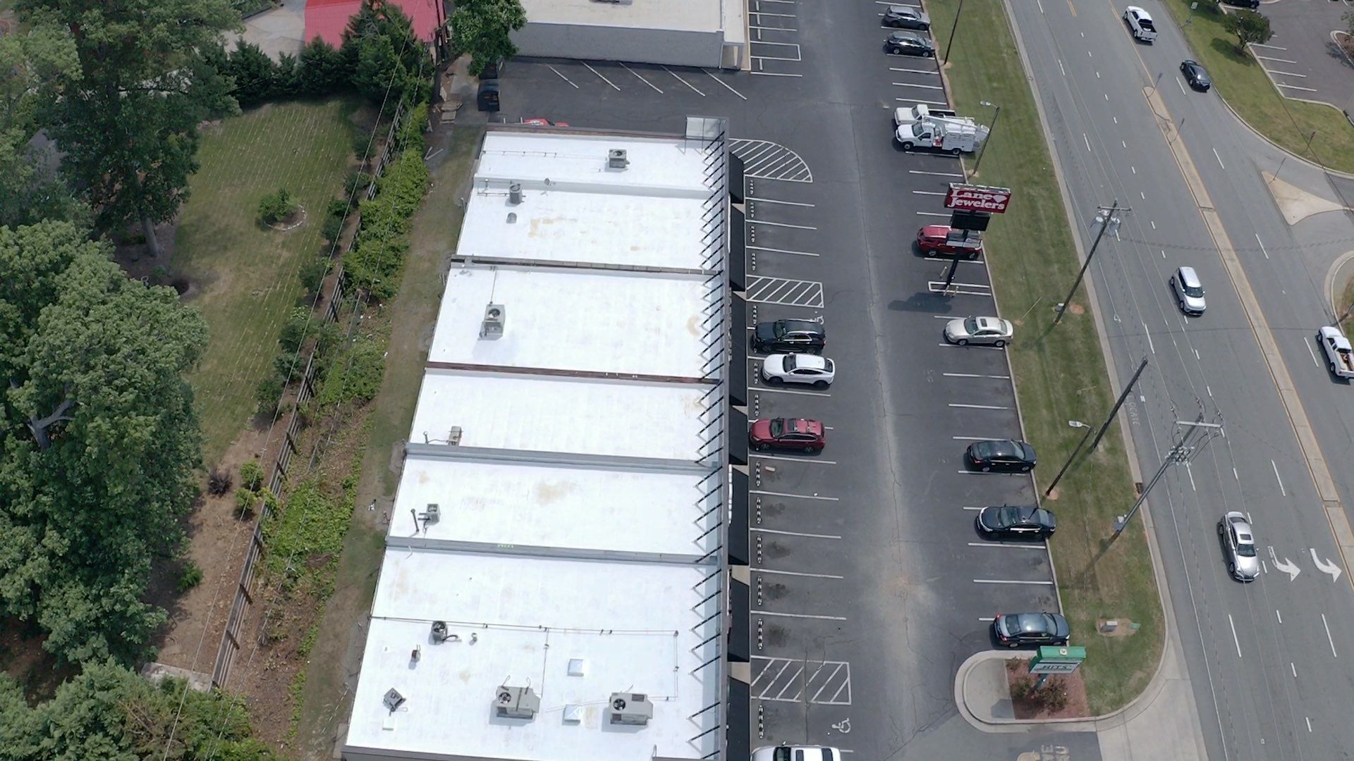 Commercial Roof Coating using Fiberseal basecoat and Silicon Topcoat by Just In Time Roofing and Restoration