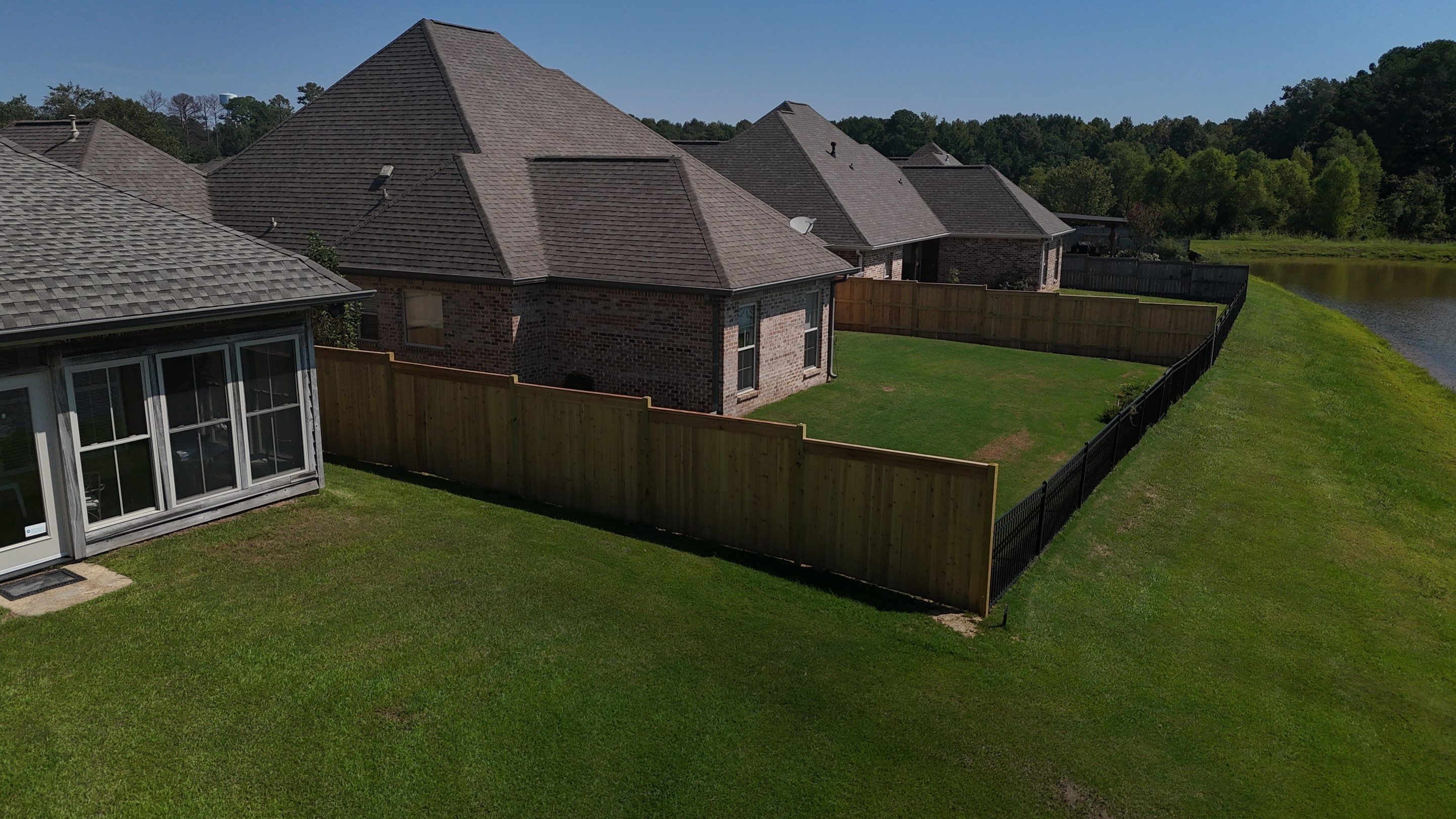 6’ Treated Pine Good Neighbor w/4’ Steel by Roberson Construction LLC