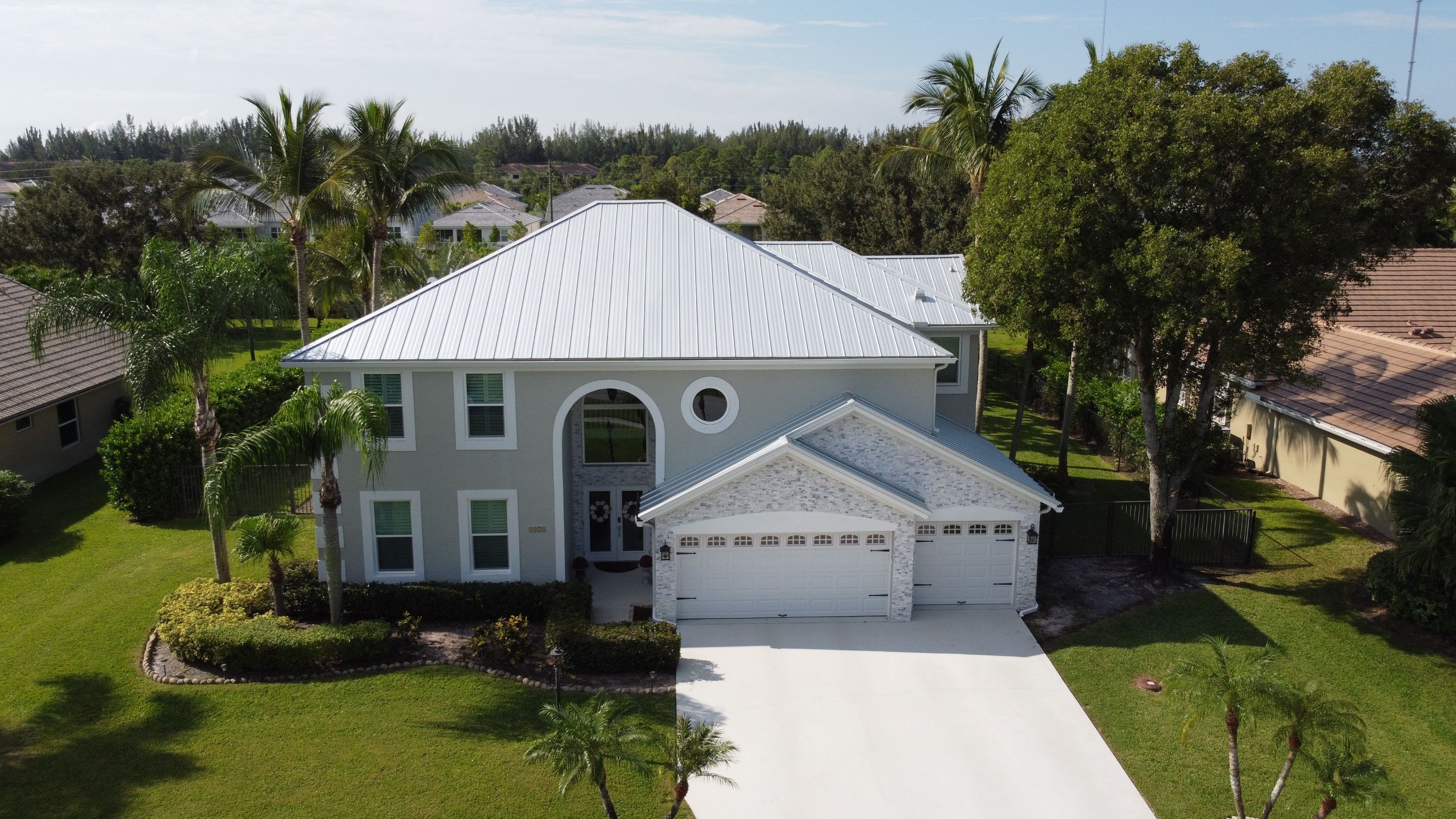 Residential Roofing Installation using 1" Nail strip metal roof by BLUES BROTHERS CONSTRUCTION CORP