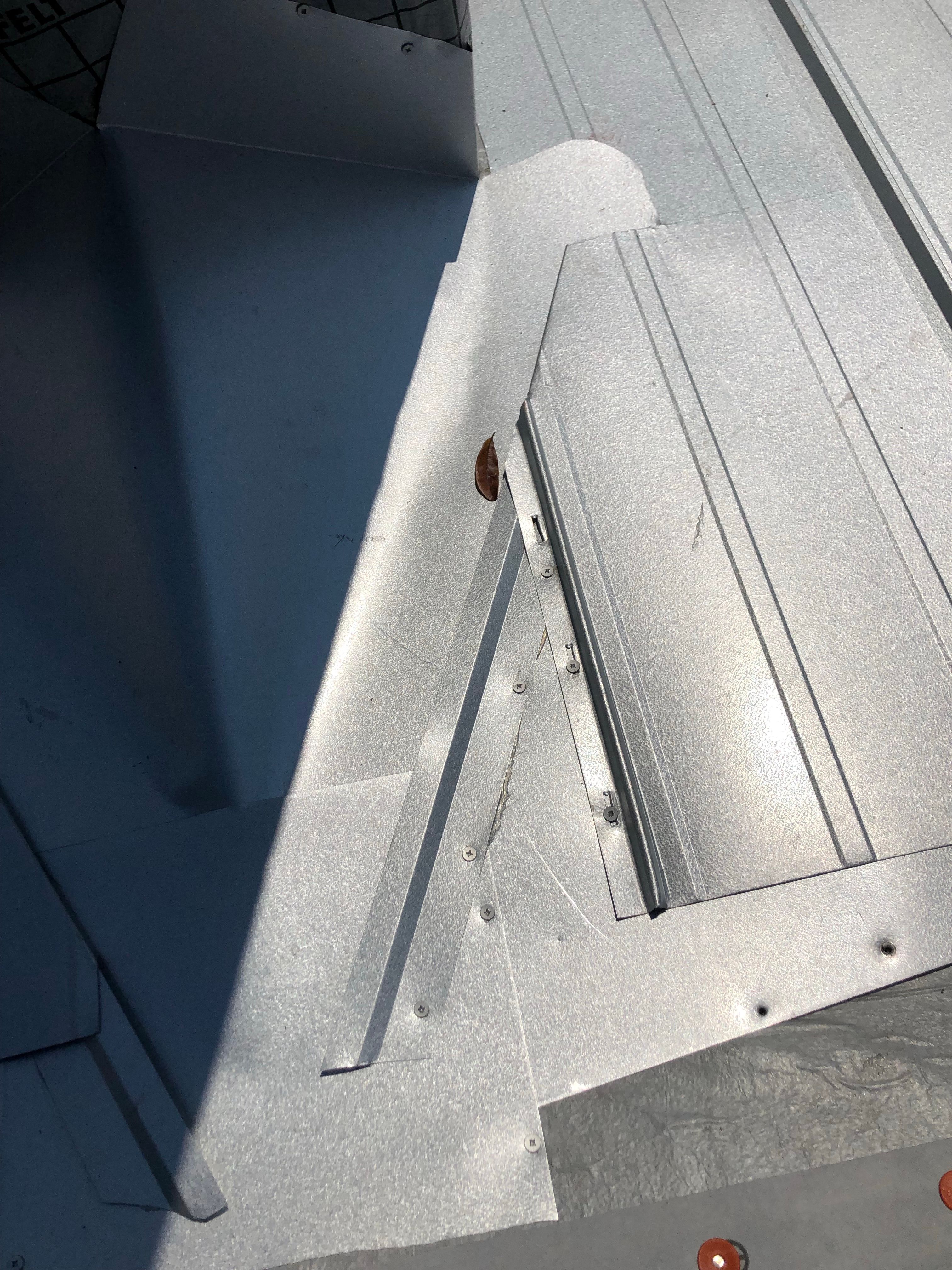 Residential Roofing Installation using Metal roofing by American Roofing & Construction LLC