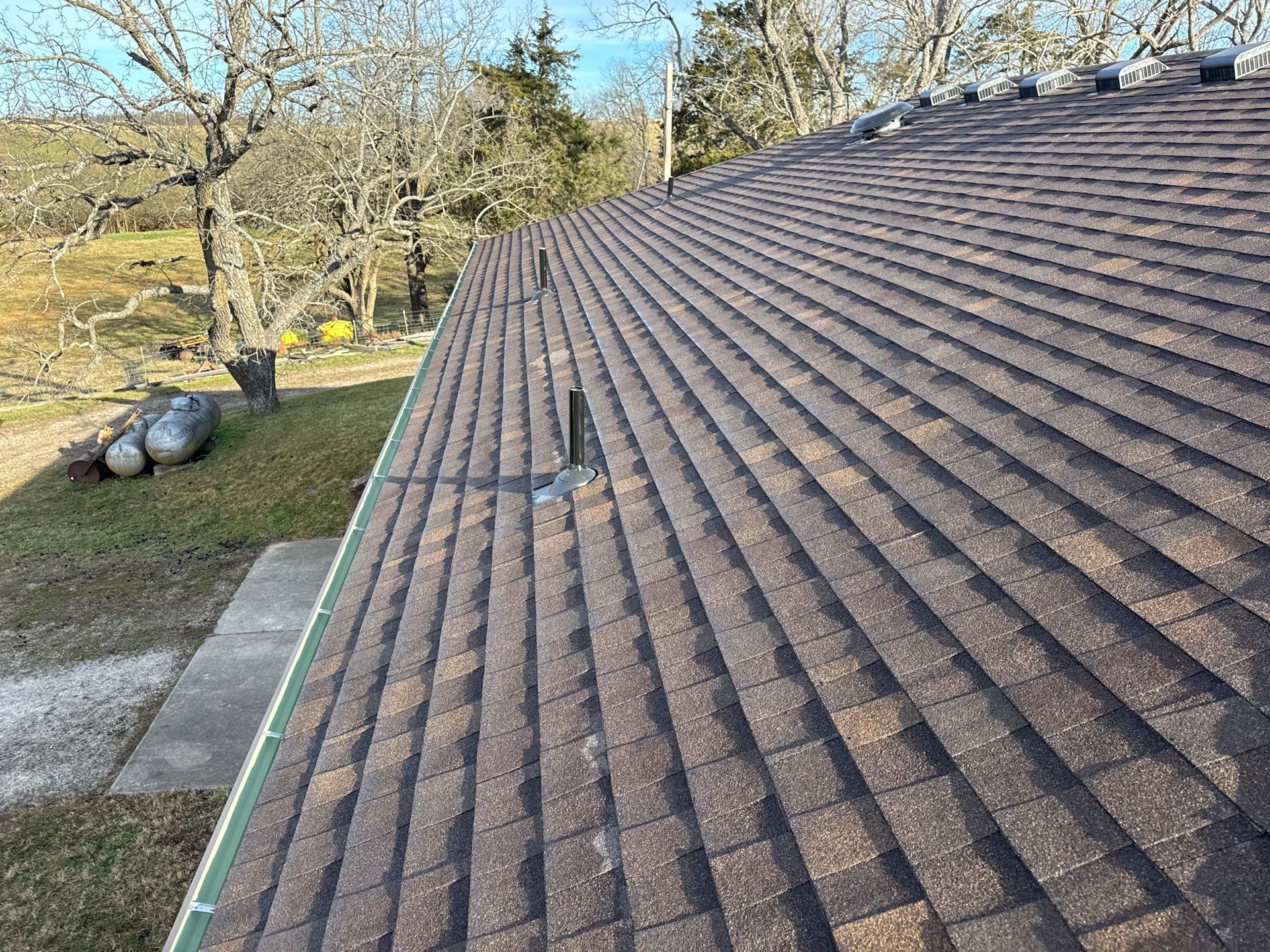 Multi Structure Residential Roofing & Gutters Install  by Titan Commercial & Residential Roofing 