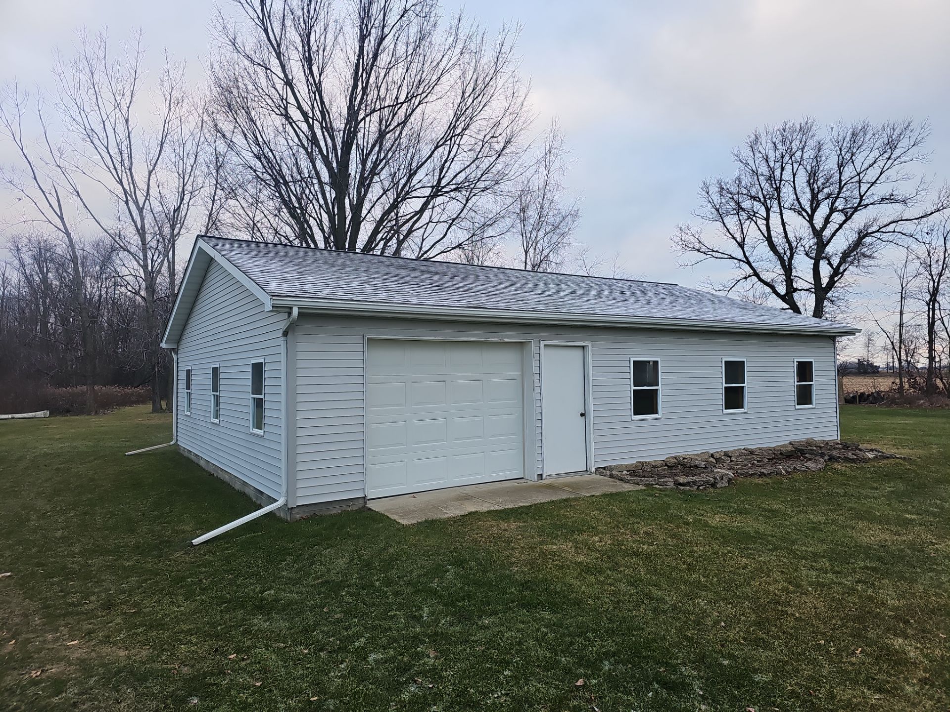 Cypress Siding and New Gutters by 42 North Construction, LLC.