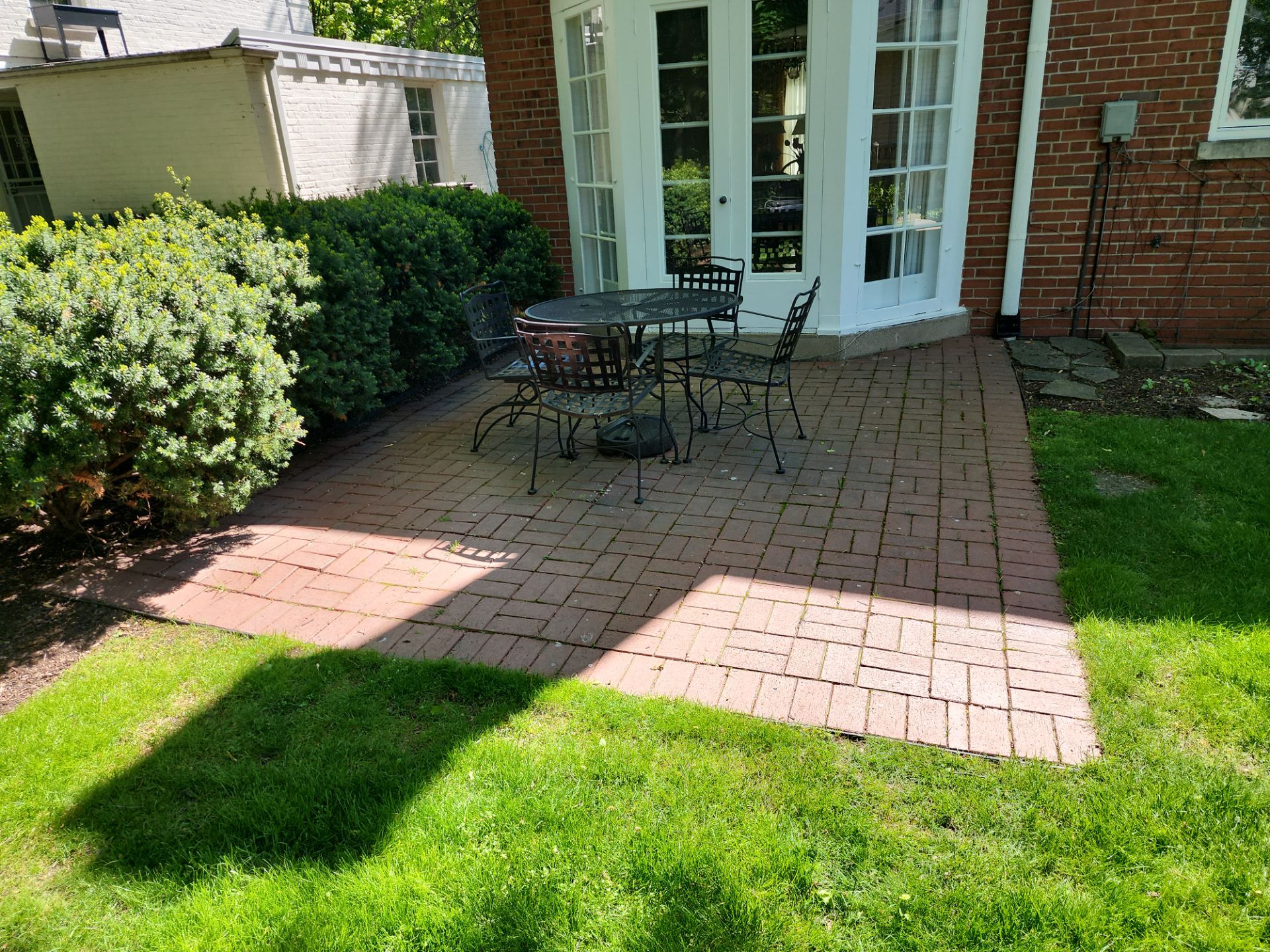 Brick Paver cleaning, sanding, seal by Northern Power Washing LLC.