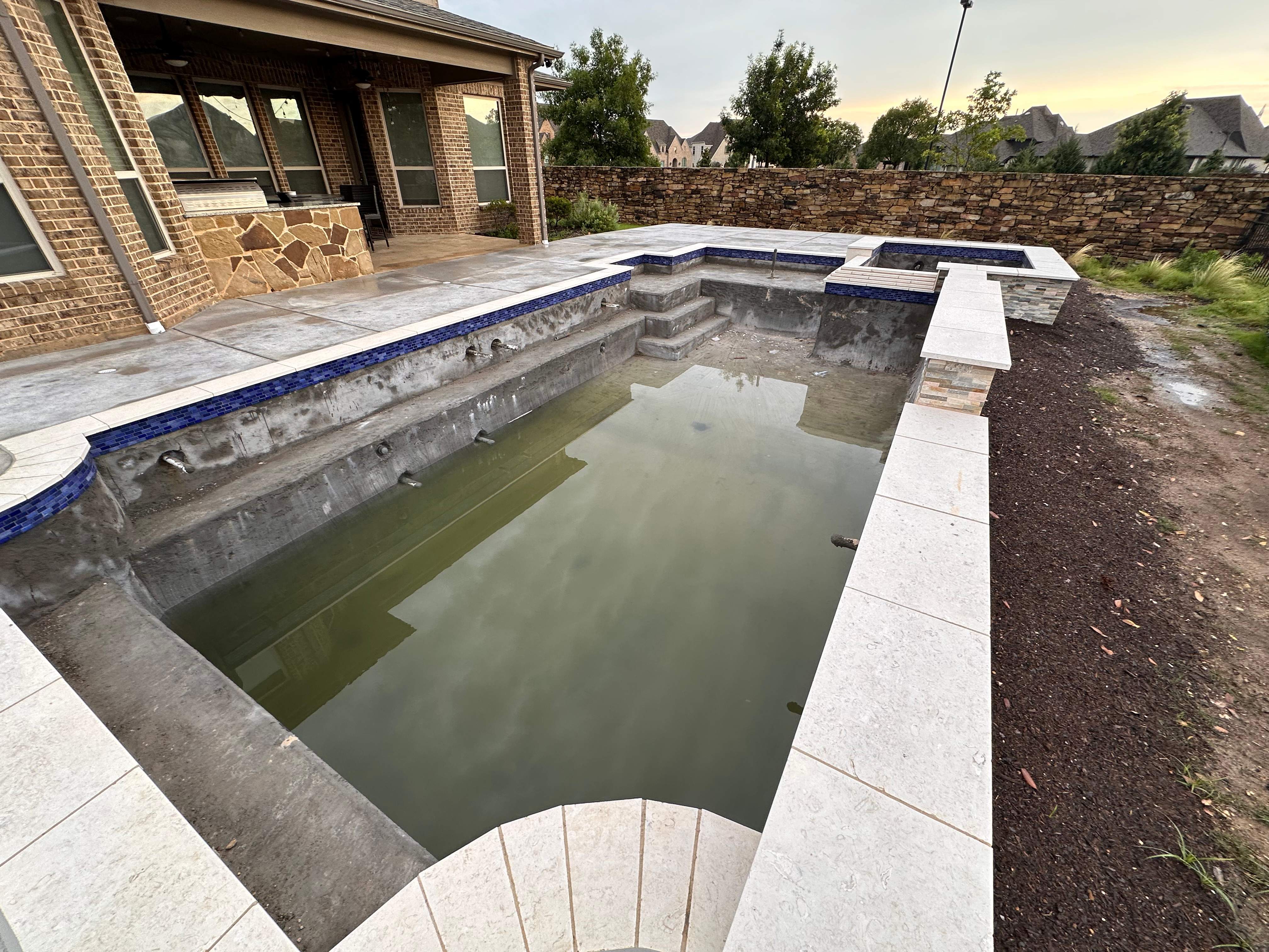 Geometric Pool with Raised Spa by Pinnacle Pools and Spas - DFW