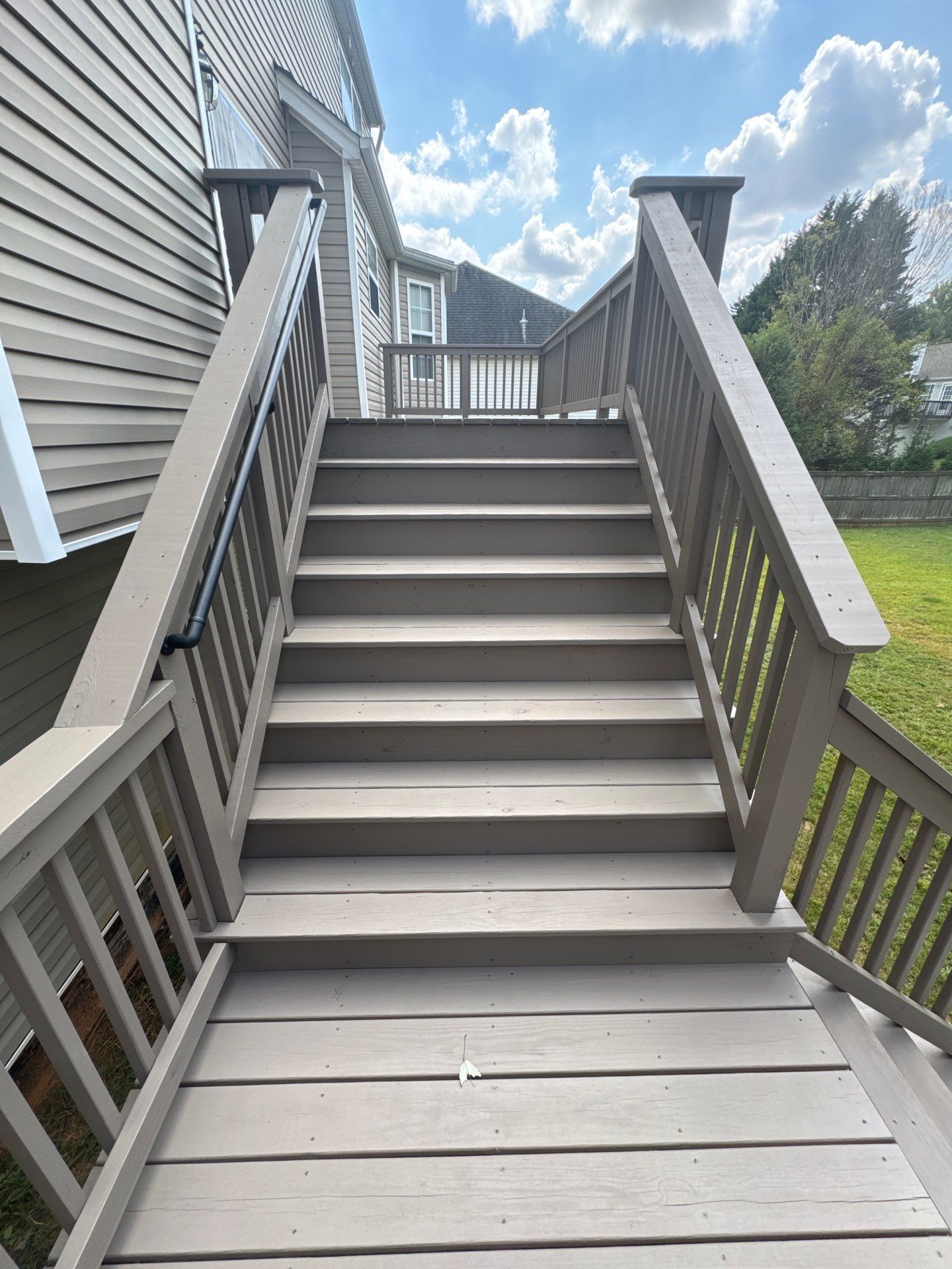 Multi-Level Deck Restoration and Solid Color Staining in Suwanee by Swift Home Renovations