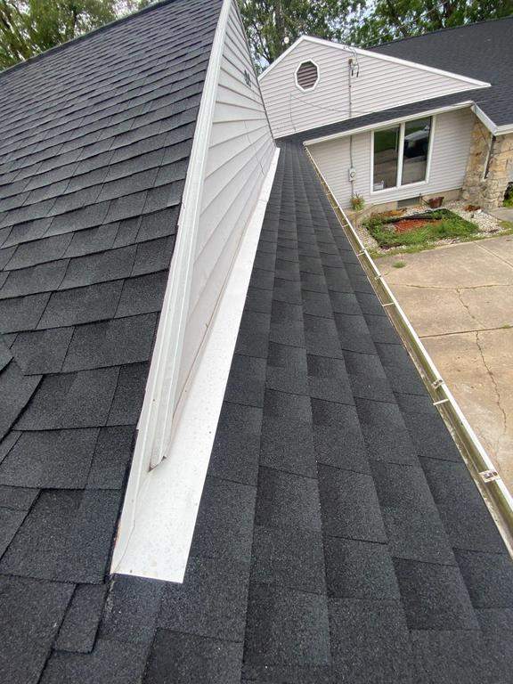 Storm damage roof replacement by Nitro Roofing and Construction