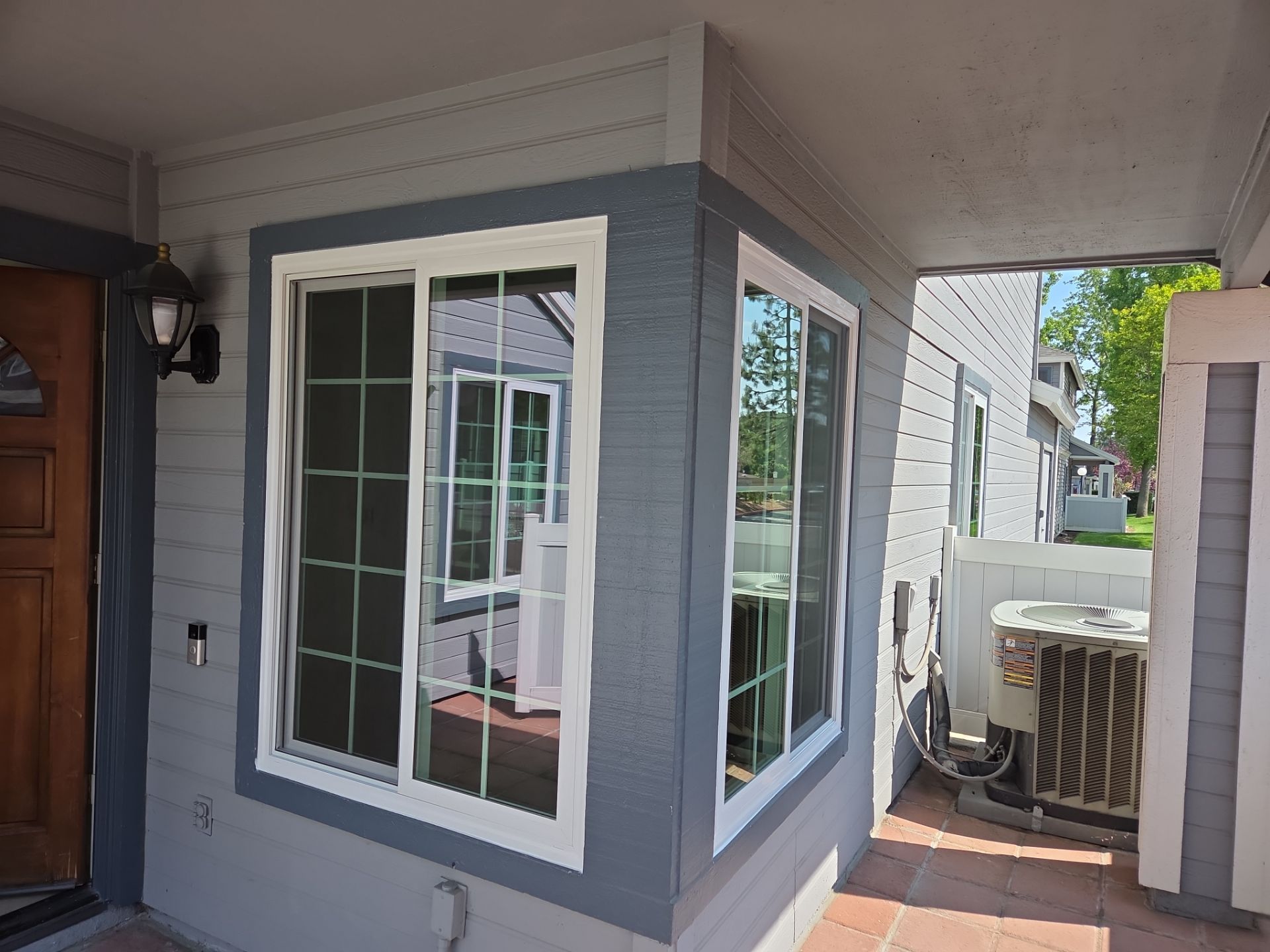 Window Installation using Milgard V300 Trinsic with grids by American Window Company
